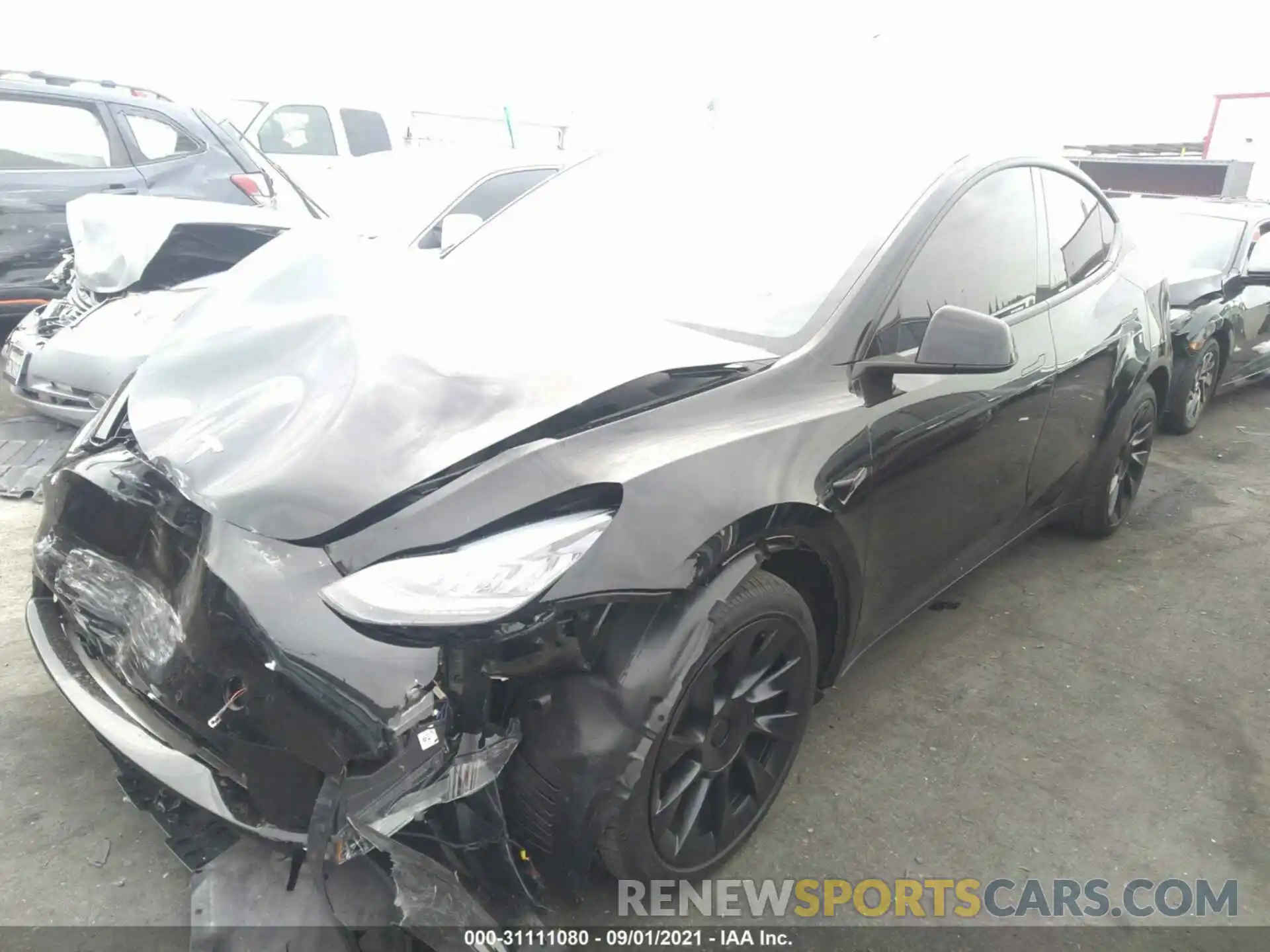 2 Photograph of a damaged car 5YJYGDEE3MF207256 TESLA MODEL Y 2021