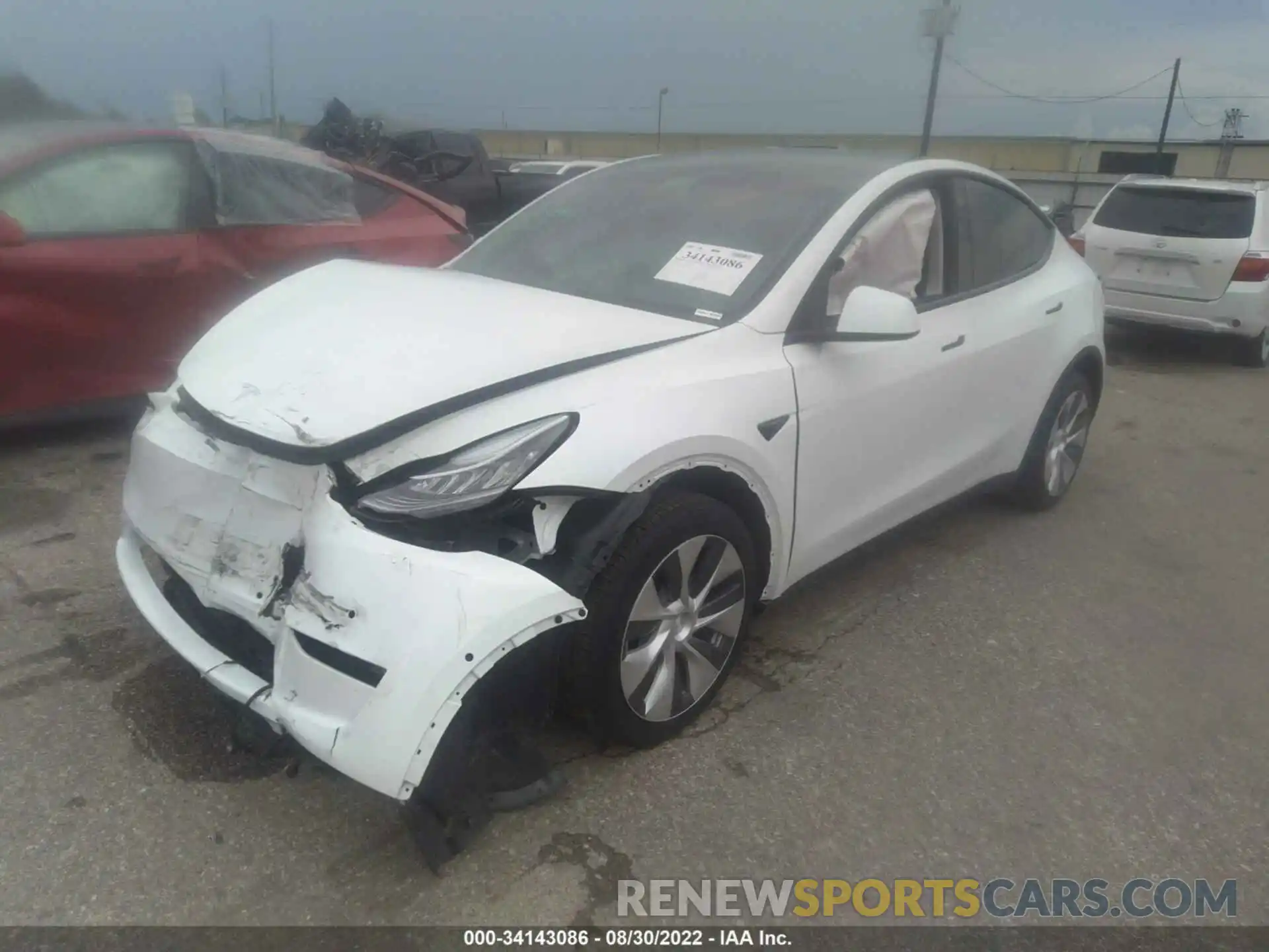 2 Photograph of a damaged car 5YJYGDEE3MF212876 TESLA MODEL Y 2021