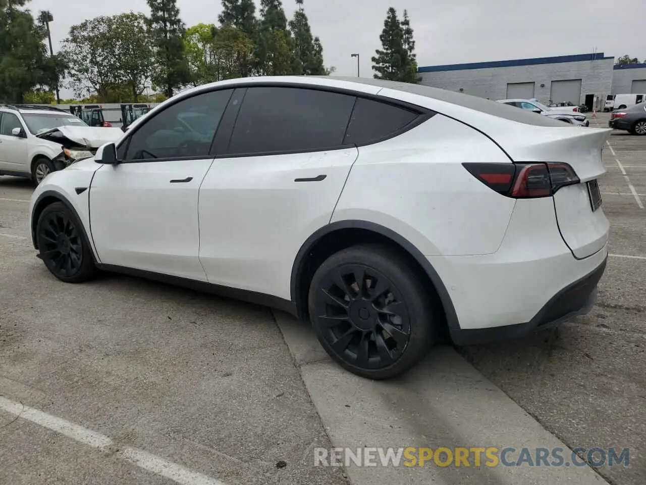 2 Photograph of a damaged car 5YJYGDEE3MF214823 TESLA MODEL Y 2021