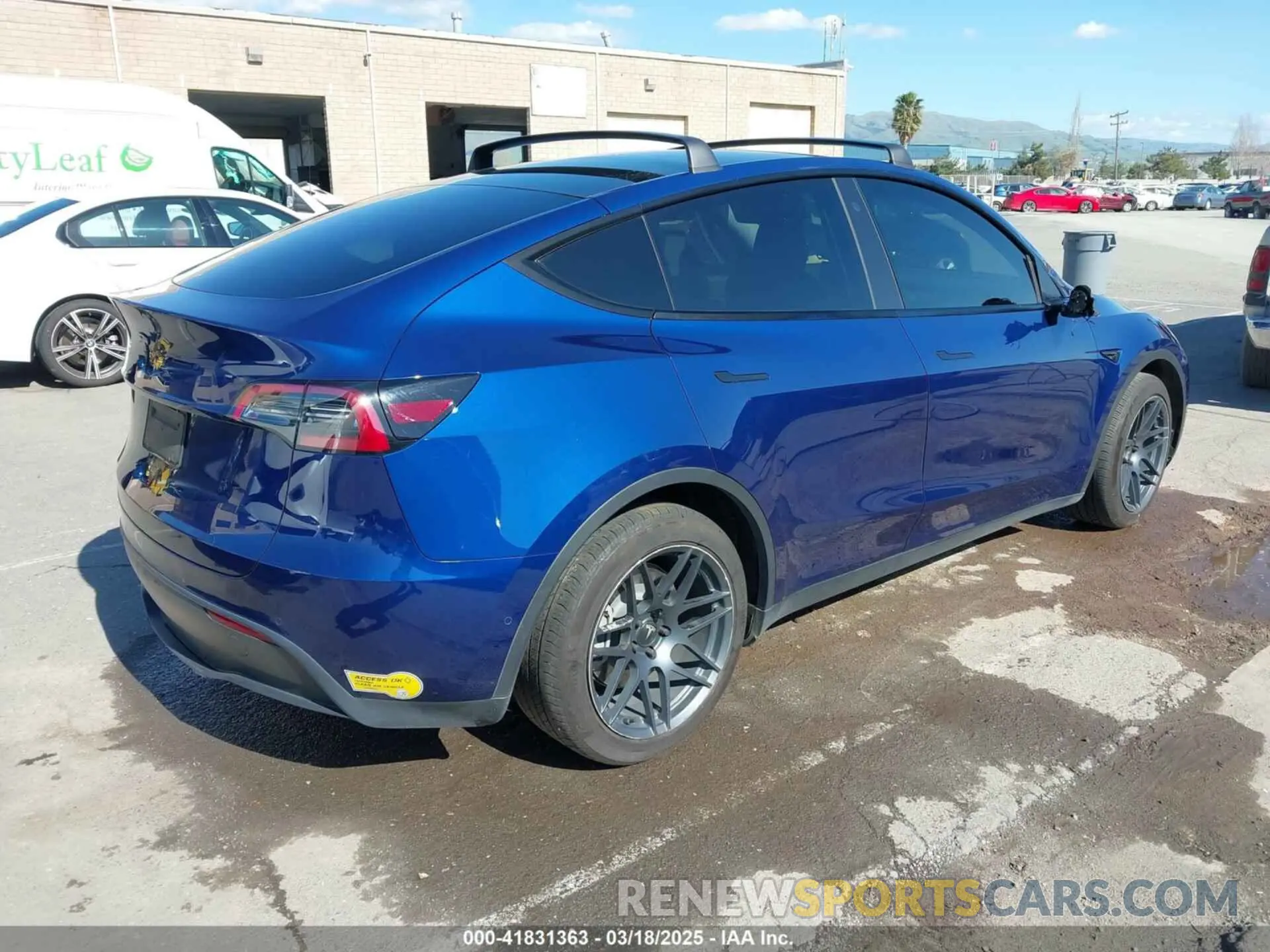 4 Photograph of a damaged car 5YJYGDEE3MF218743 TESLA MODEL Y 2021