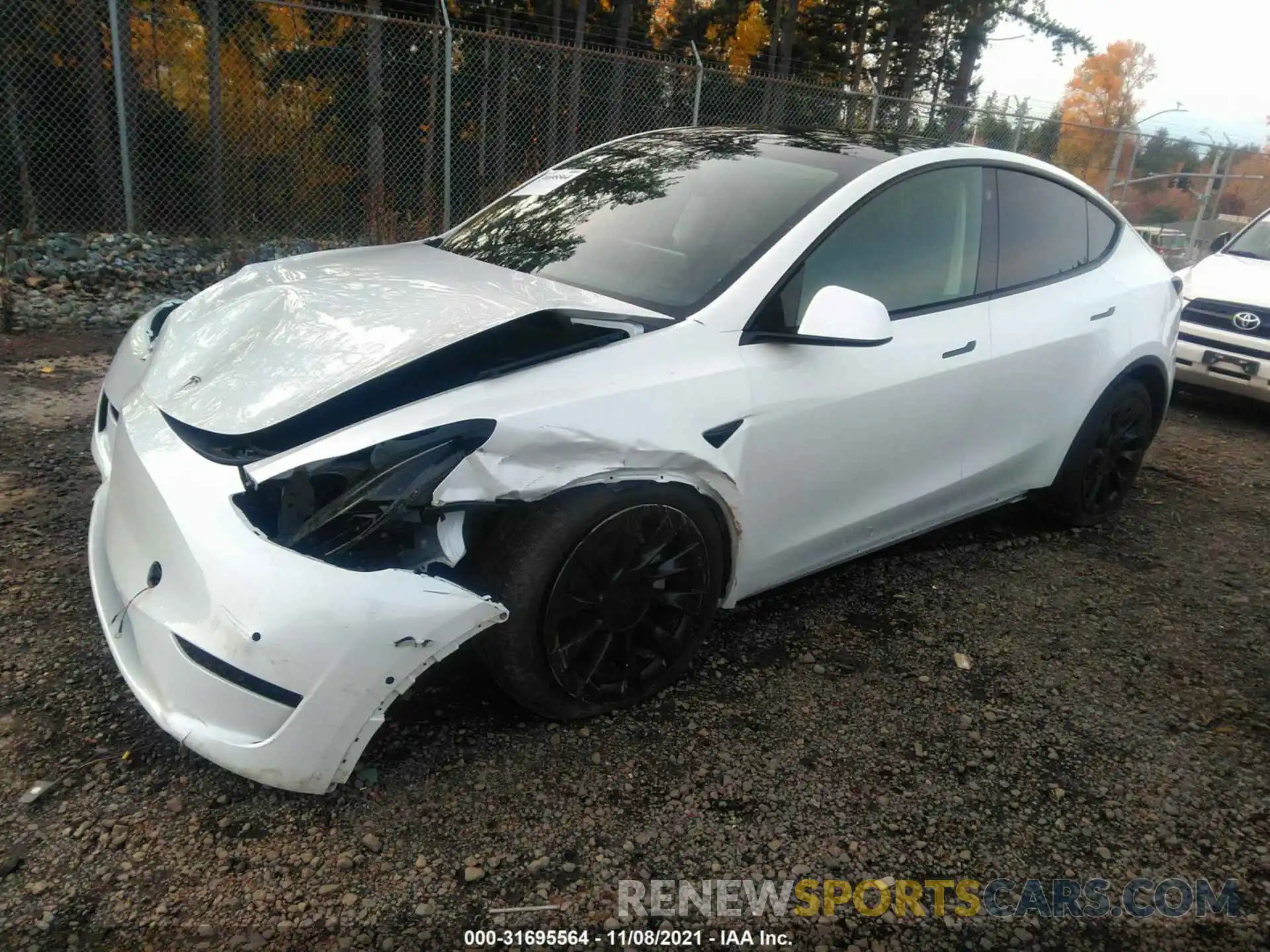 2 Photograph of a damaged car 5YJYGDEE3MF229452 TESLA MODEL Y 2021