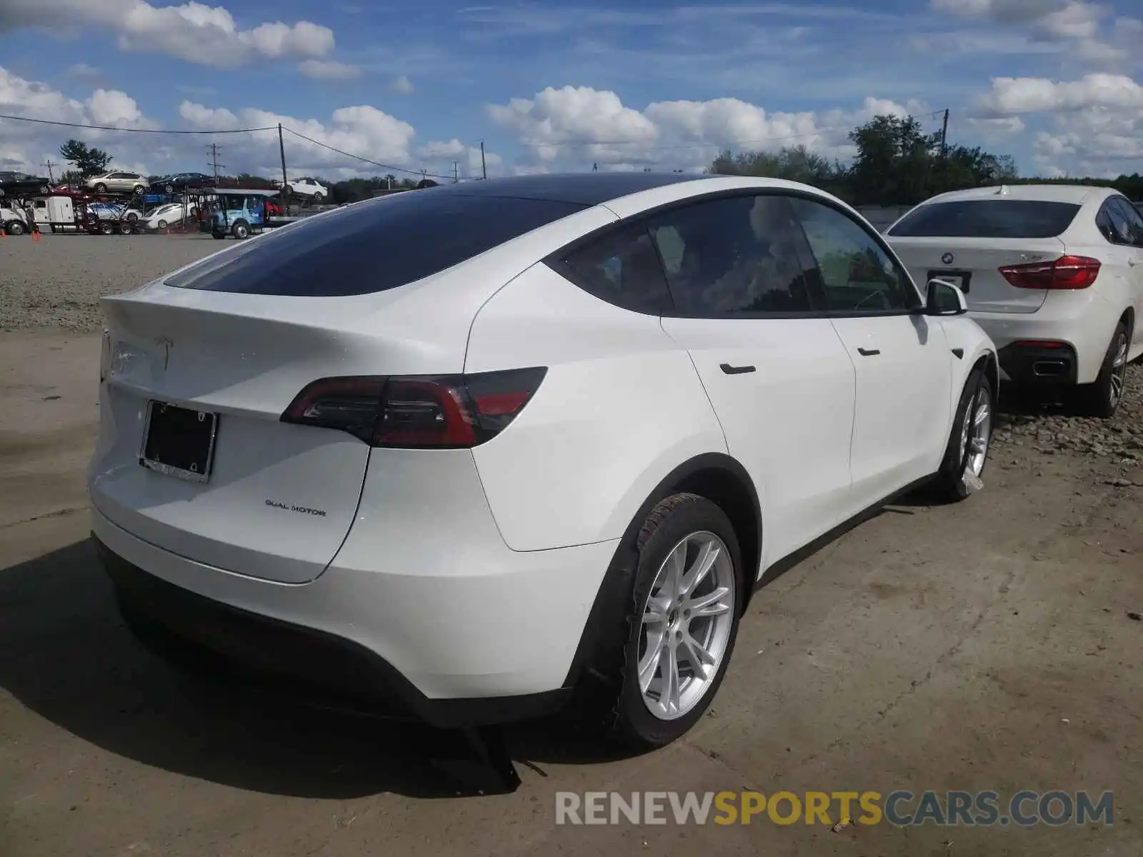 4 Photograph of a damaged car 5YJYGDEE3MF255761 TESLA MODEL Y 2021