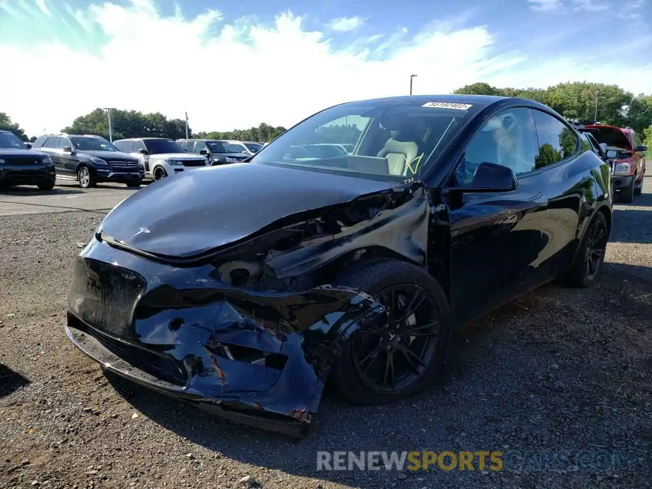 2 Photograph of a damaged car 5YJYGDEE3MF260247 TESLA MODEL Y 2021