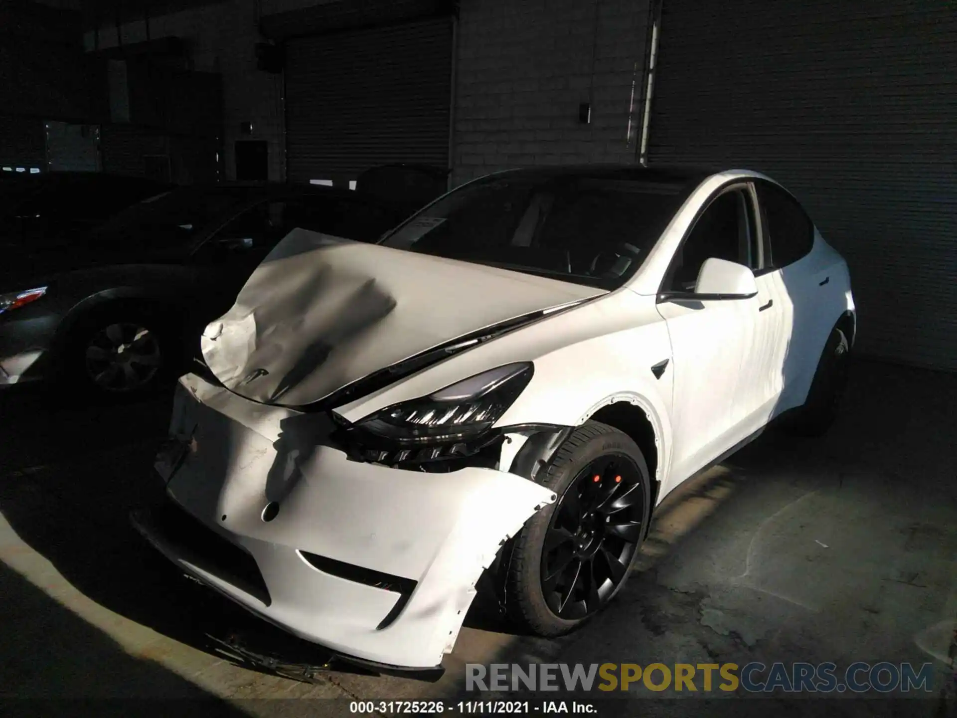 2 Photograph of a damaged car 5YJYGDEE4MF194324 TESLA MODEL Y 2021