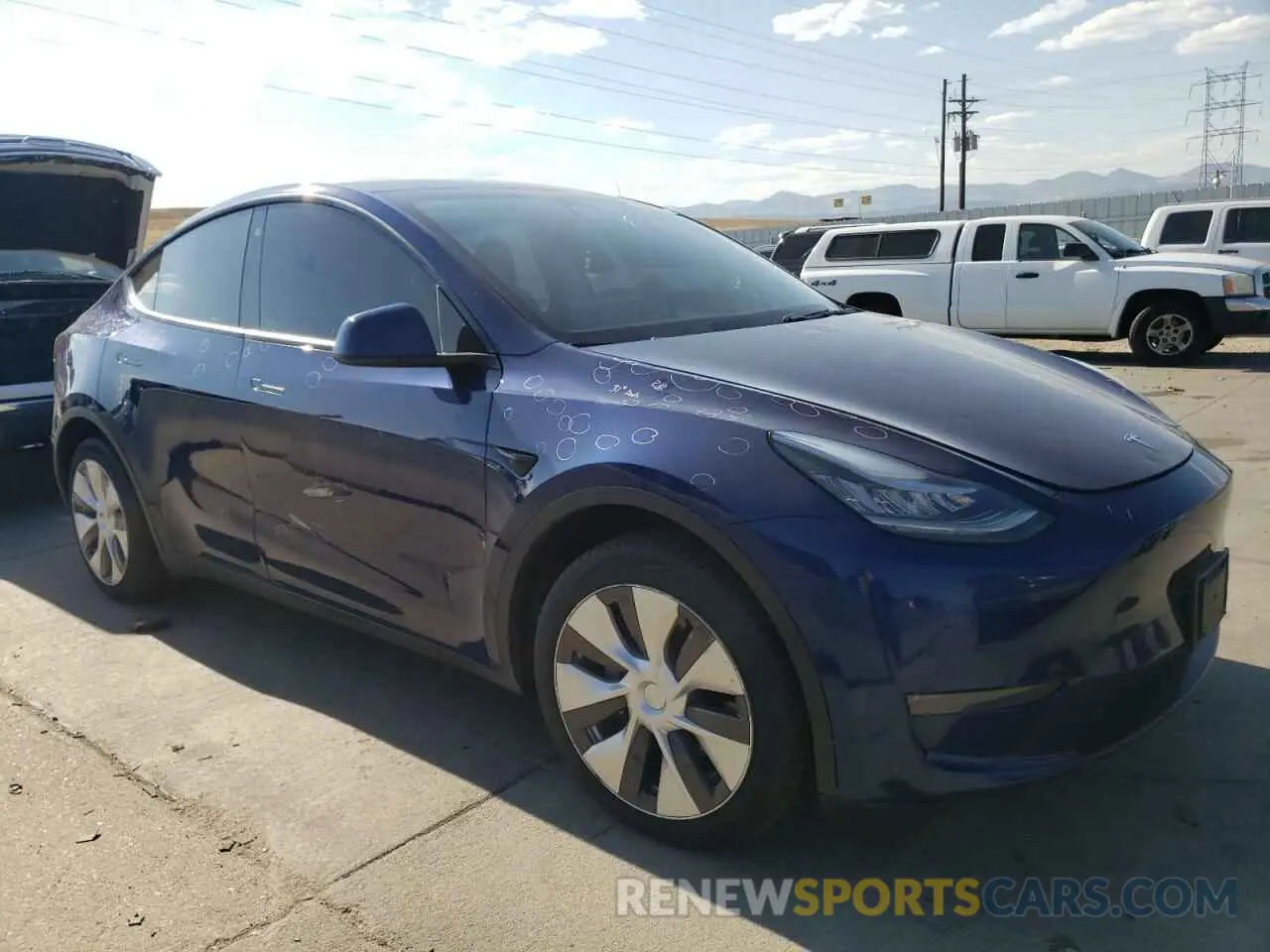 4 Photograph of a damaged car 5YJYGDEE5MF083880 TESLA MODEL Y 2021