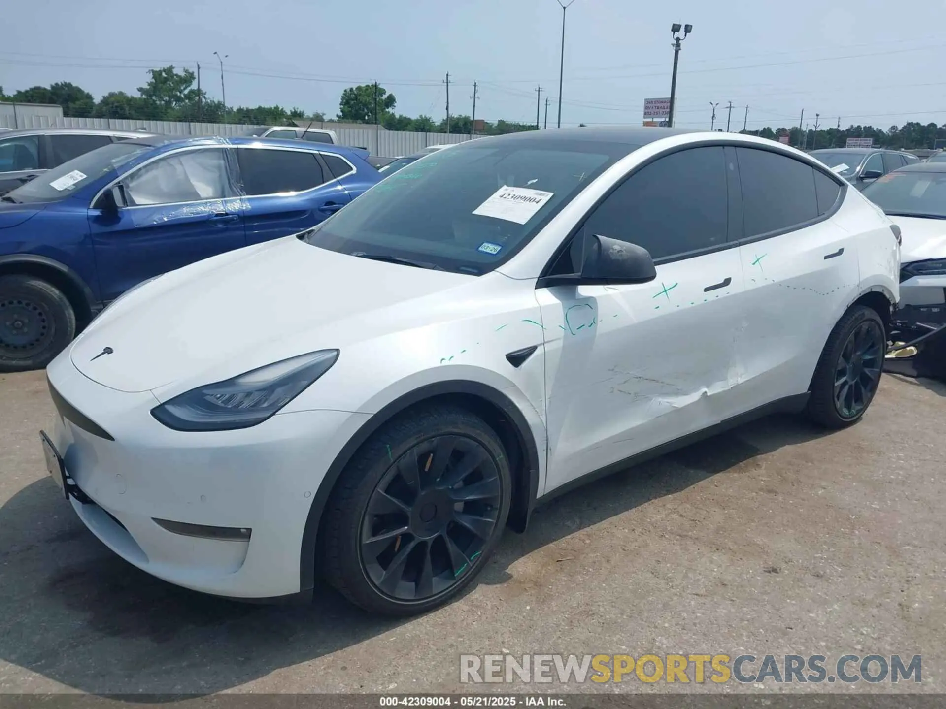 2 Photograph of a damaged car 5YJYGDEE5MF124010 TESLA MODEL Y 2021
