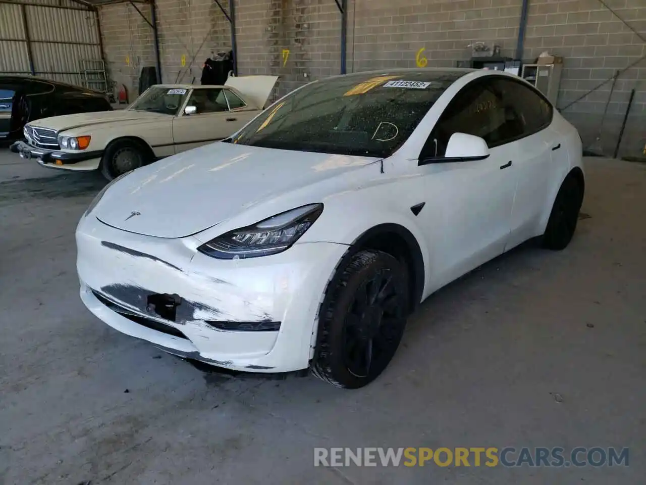 2 Photograph of a damaged car 5YJYGDEE5MF175779 TESLA MODEL Y 2021