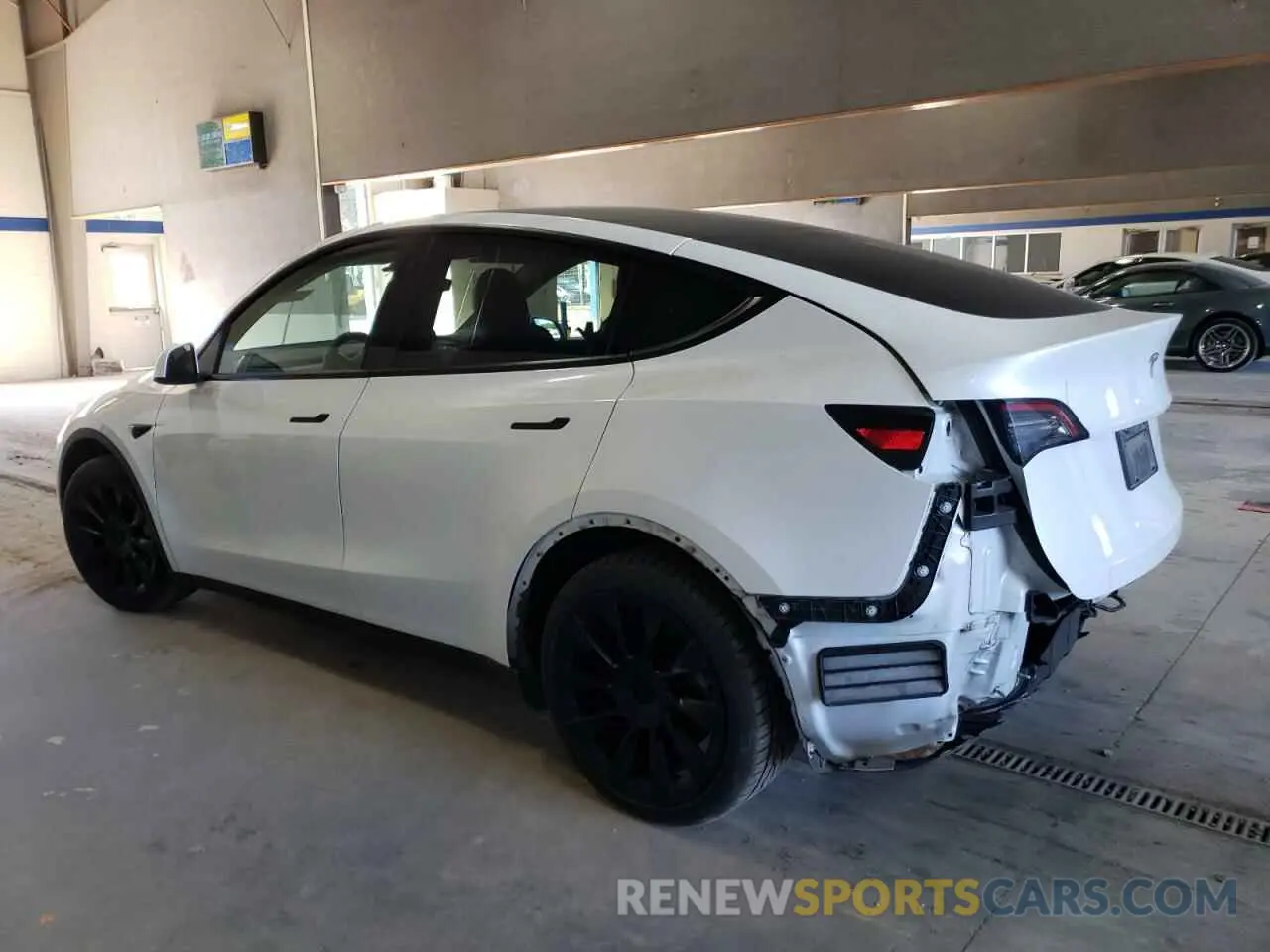 2 Photograph of a damaged car 5YJYGDEE6MF065212 TESLA MODEL Y 2021