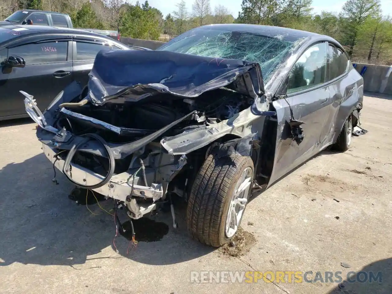 2 Photograph of a damaged car 5YJYGDEE6MF081846 TESLA MODEL Y 2021