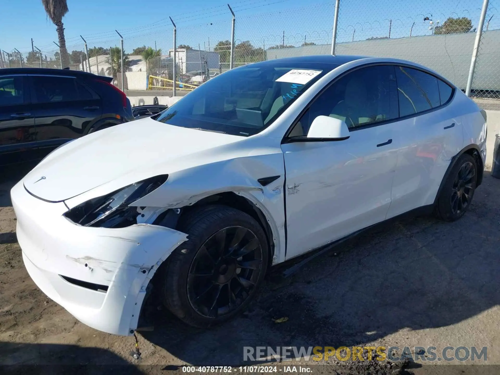 2 Photograph of a damaged car 5YJYGDEE6MF098324 TESLA MODEL Y 2021