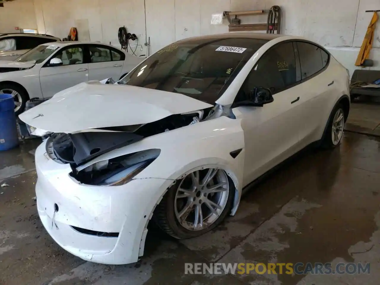 2 Photograph of a damaged car 5YJYGDEE6MF101058 TESLA MODEL Y 2021