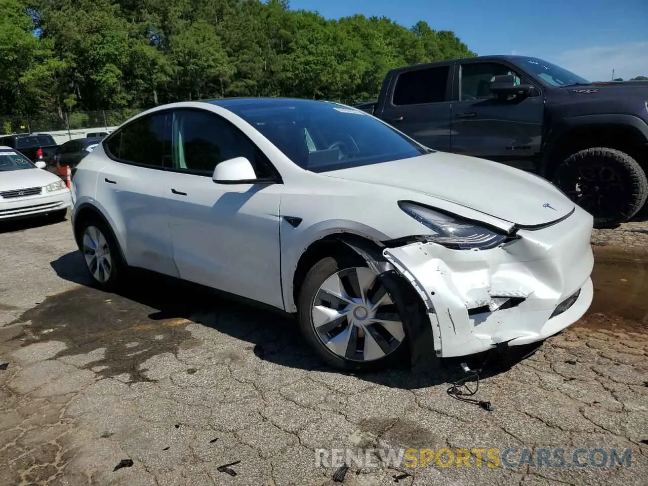 4 Photograph of a damaged car 5YJYGDEE6MF140510 TESLA MODEL Y 2021