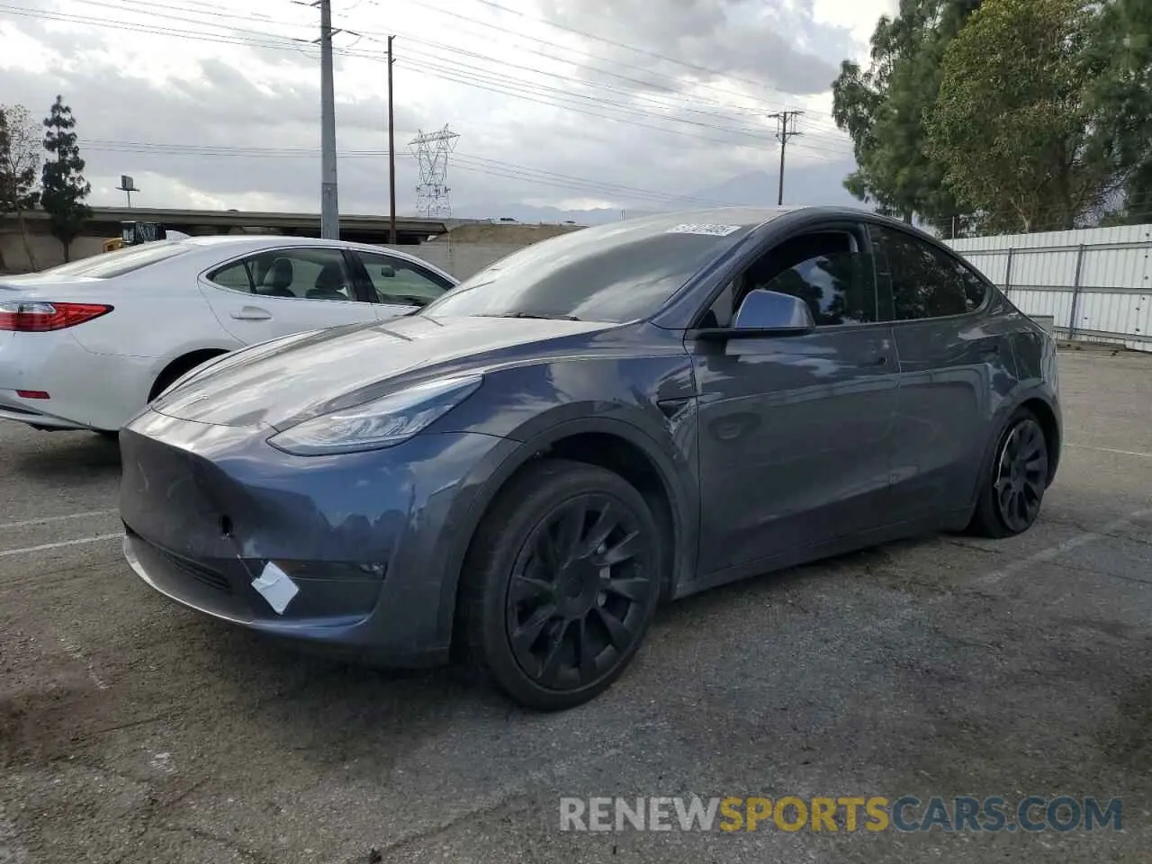 1 Photograph of a damaged car 5YJYGDEE6MF200883 TESLA MODEL Y 2021