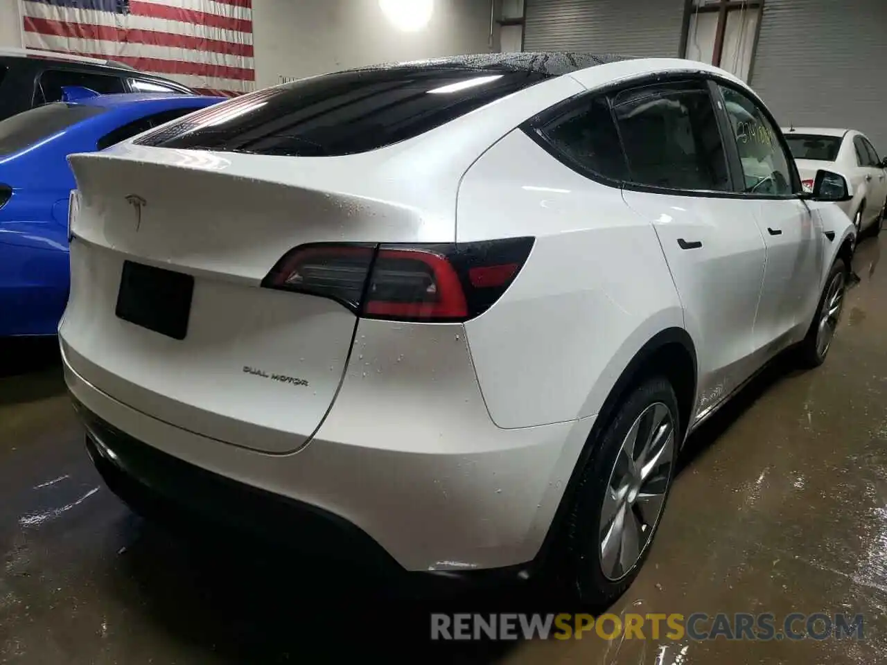 4 Photograph of a damaged car 5YJYGDEE7MF065428 TESLA MODEL Y 2021