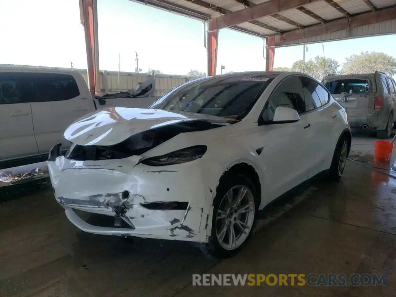 2 Photograph of a damaged car 5YJYGDEE7MF079846 TESLA MODEL Y 2021