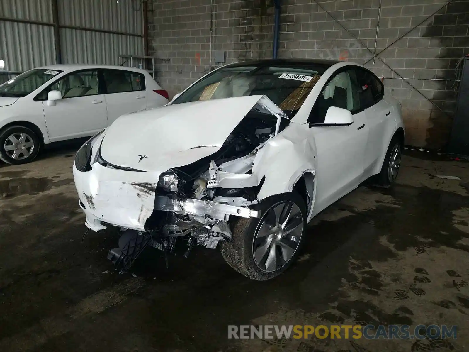 2 Photograph of a damaged car 5YJYGDEE7MF118693 TESLA MODEL Y 2021