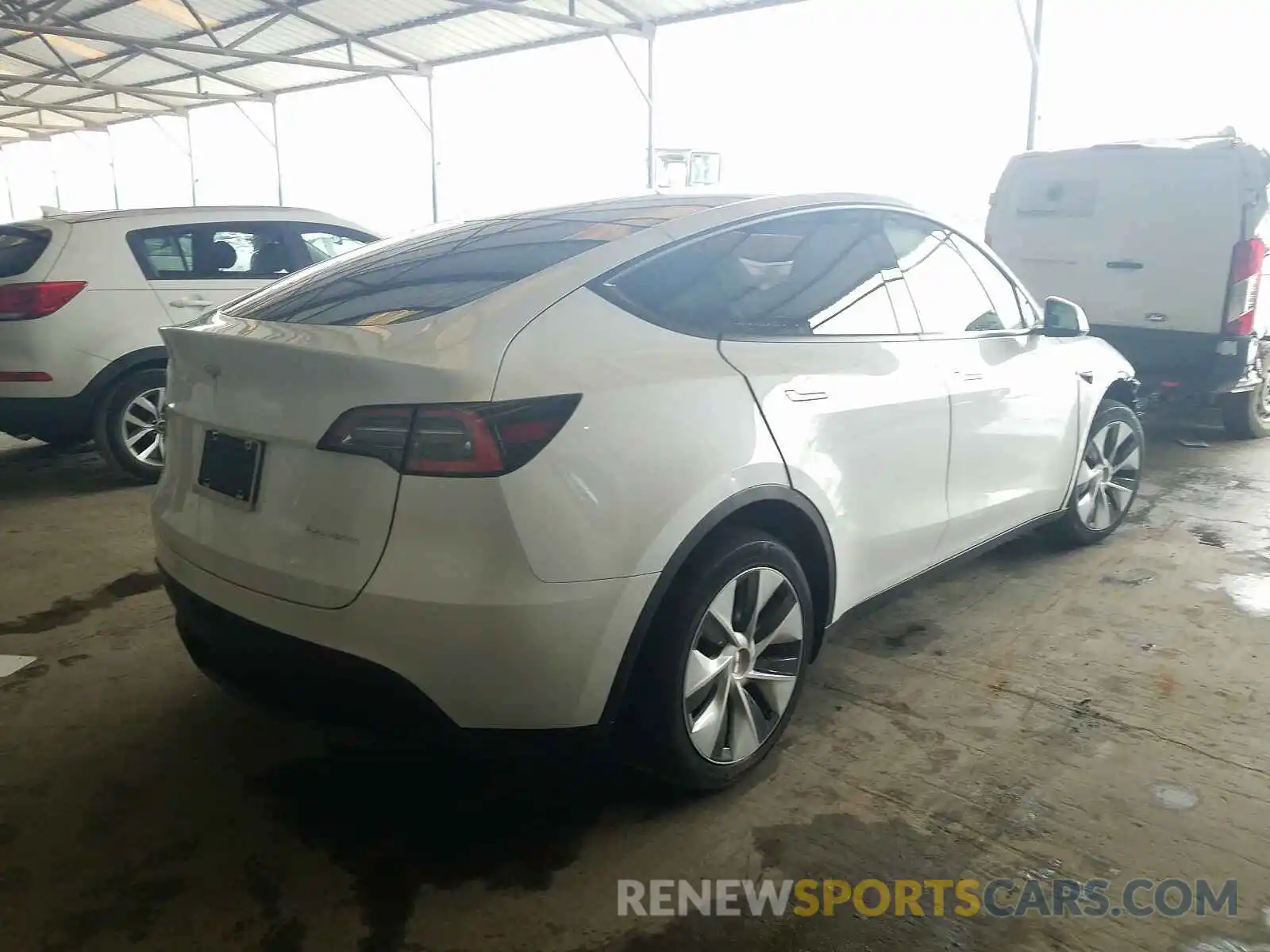 4 Photograph of a damaged car 5YJYGDEE7MF118693 TESLA MODEL Y 2021