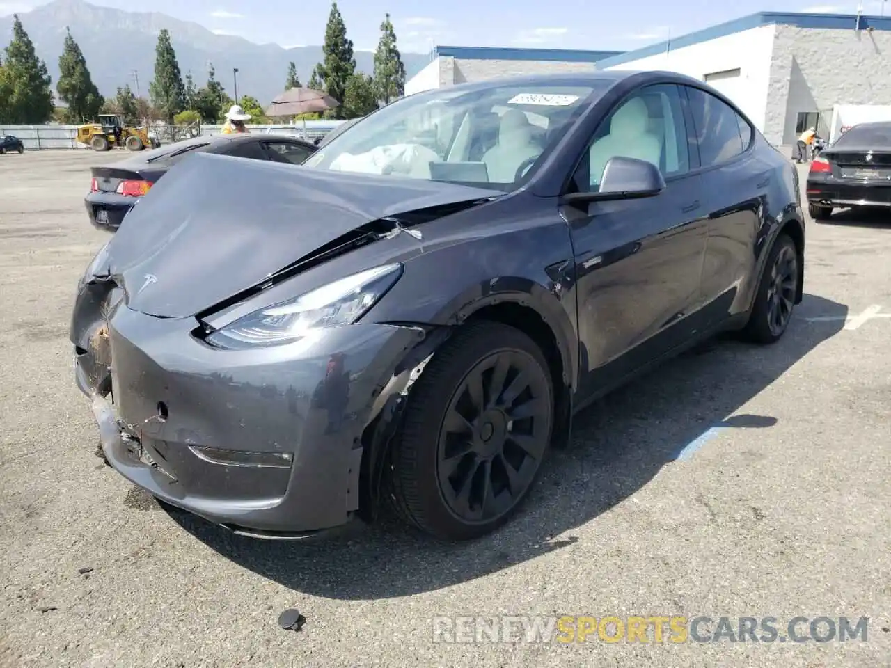 2 Photograph of a damaged car 5YJYGDEE7MF172995 TESLA MODEL Y 2021