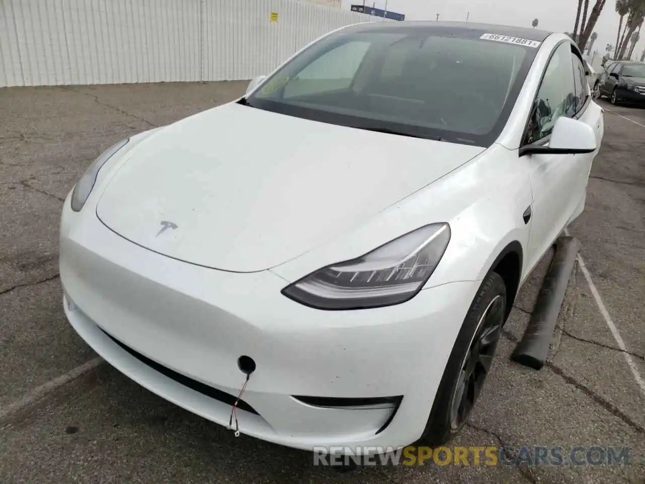 2 Photograph of a damaged car 5YJYGDEE7MF285099 TESLA MODEL Y 2021