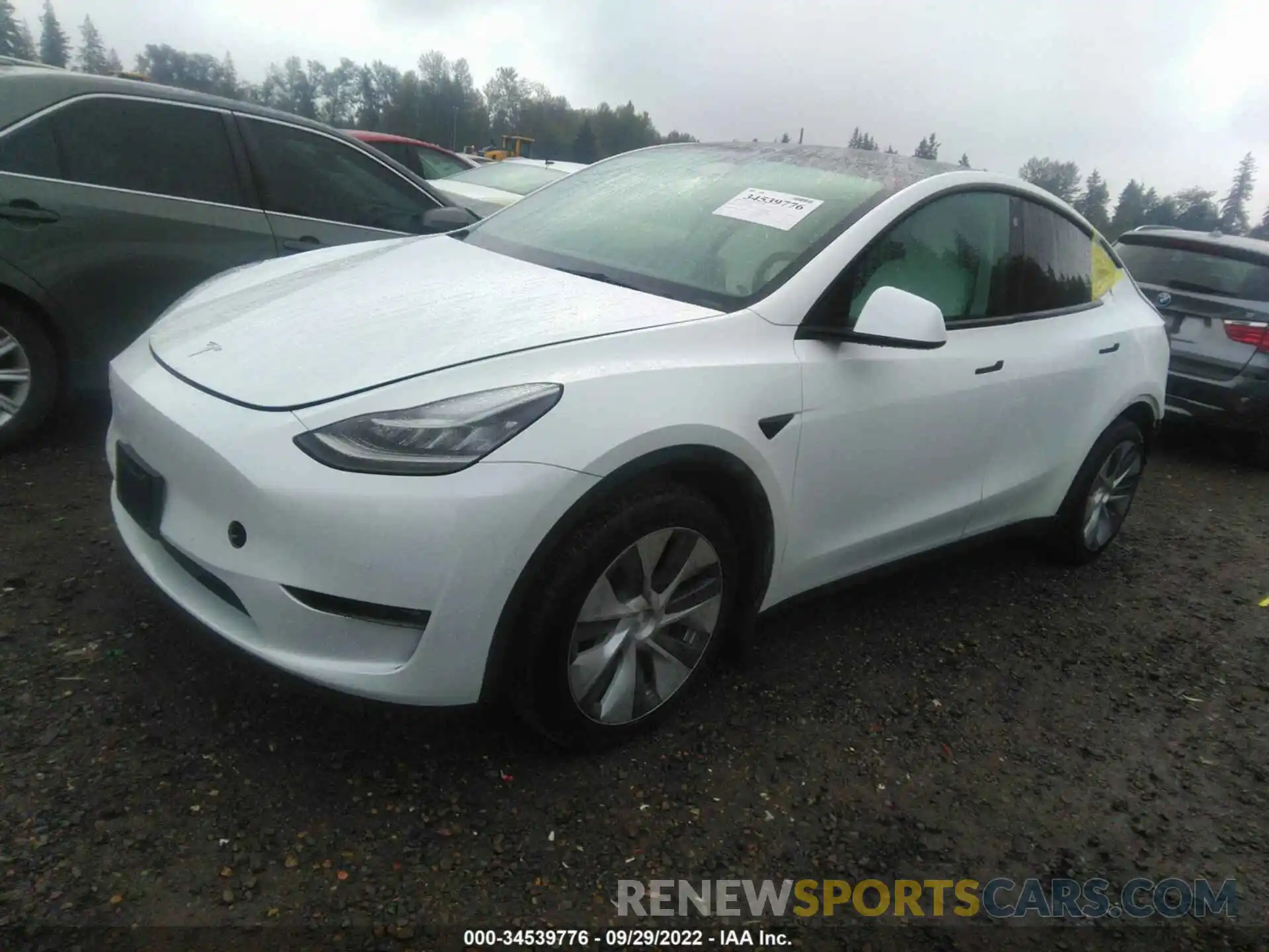 2 Photograph of a damaged car 5YJYGDEE7MF300944 TESLA MODEL Y 2021