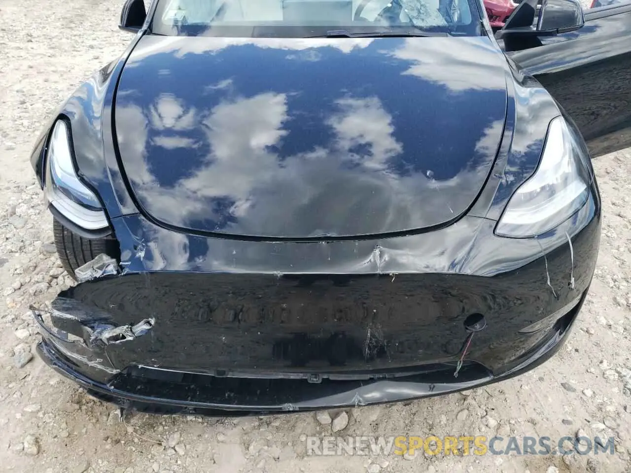 11 Photograph of a damaged car 5YJYGDEE8MF081122 TESLA MODEL Y 2021