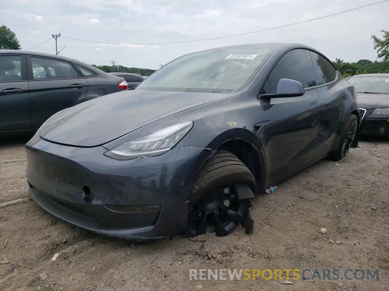 2 Photograph of a damaged car 5YJYGDEE8MF084327 TESLA MODEL Y 2021