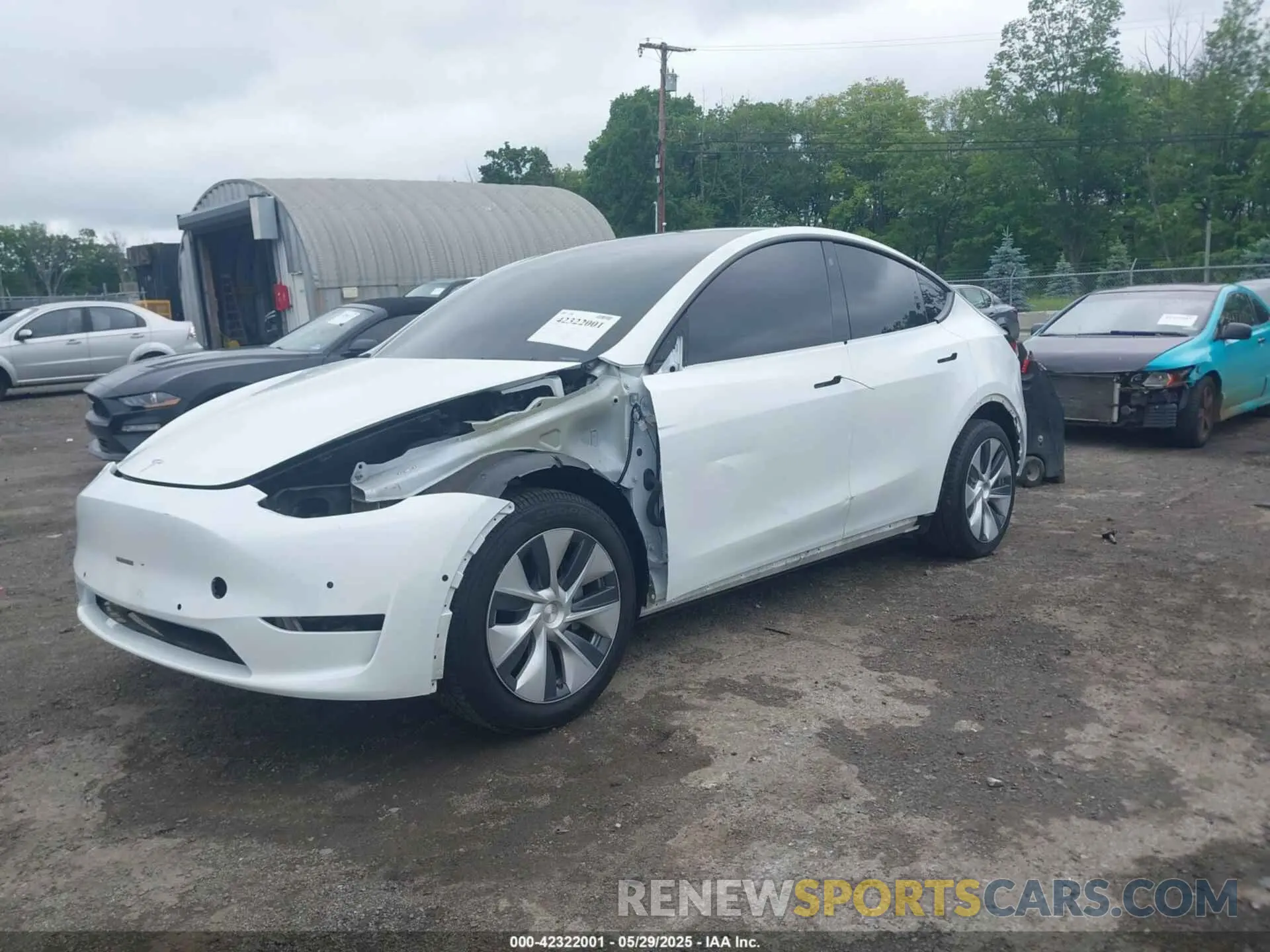 2 Photograph of a damaged car 5YJYGDEE8MF085574 TESLA MODEL Y 2021