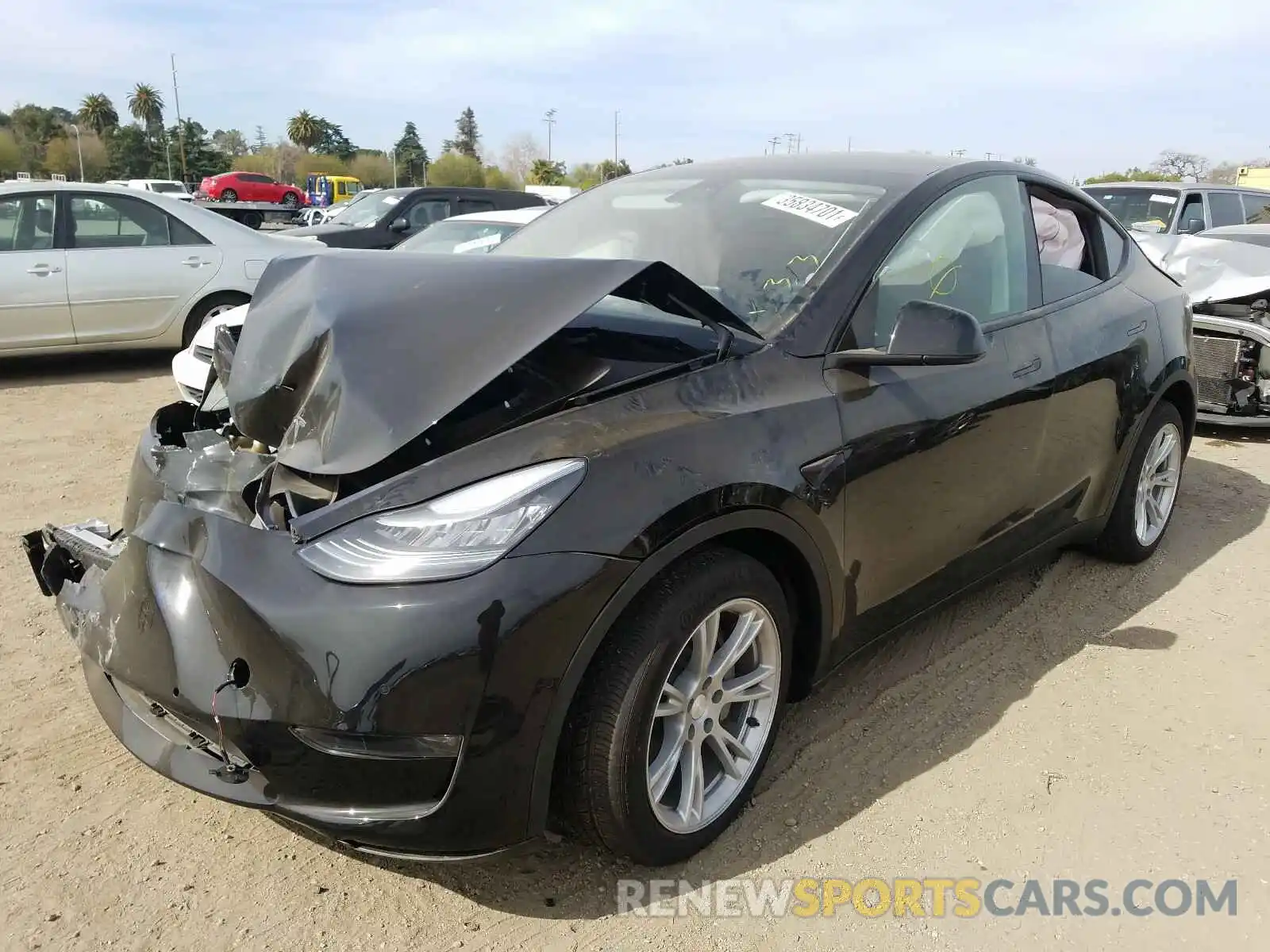 2 Photograph of a damaged car 5YJYGDEE8MF089348 TESLA MODEL Y 2021