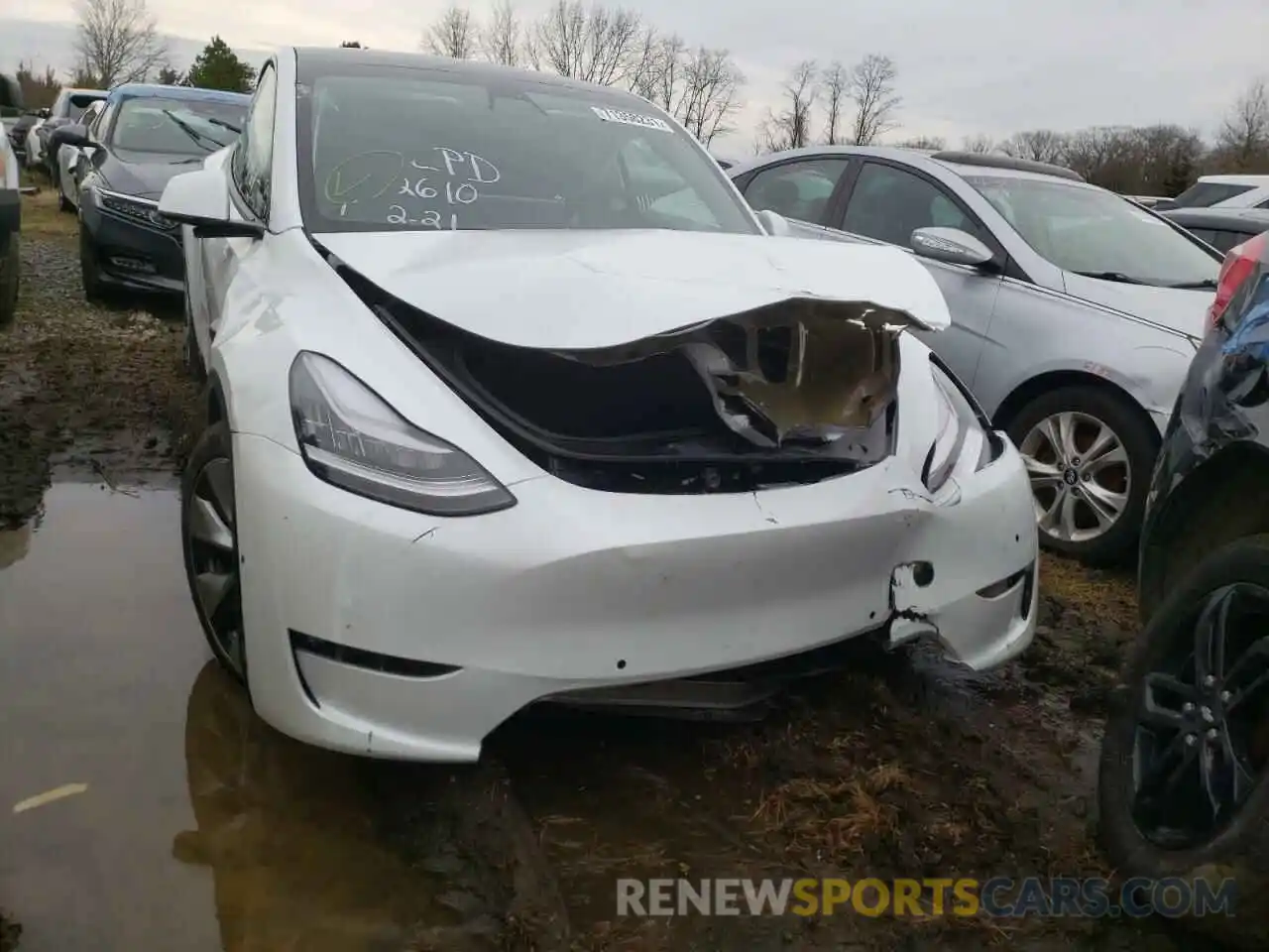 9 Photograph of a damaged car 5YJYGDEE8MF124938 TESLA MODEL Y 2021