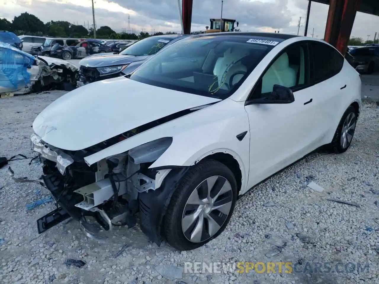 2 Photograph of a damaged car 5YJYGDEE8MF186873 TESLA MODEL Y 2021