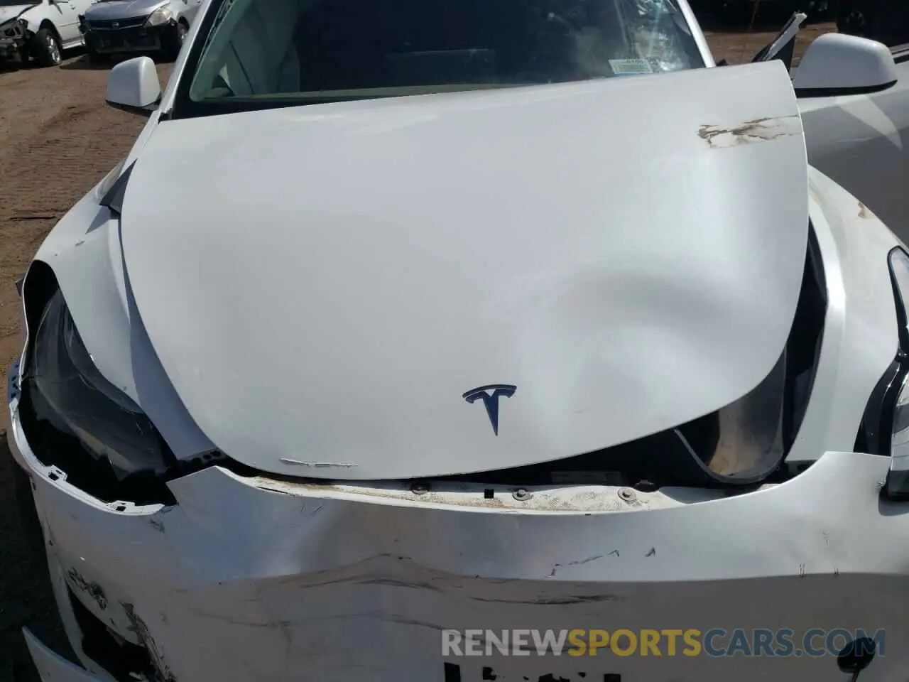 11 Photograph of a damaged car 5YJYGDEE8MF207009 TESLA MODEL Y 2021