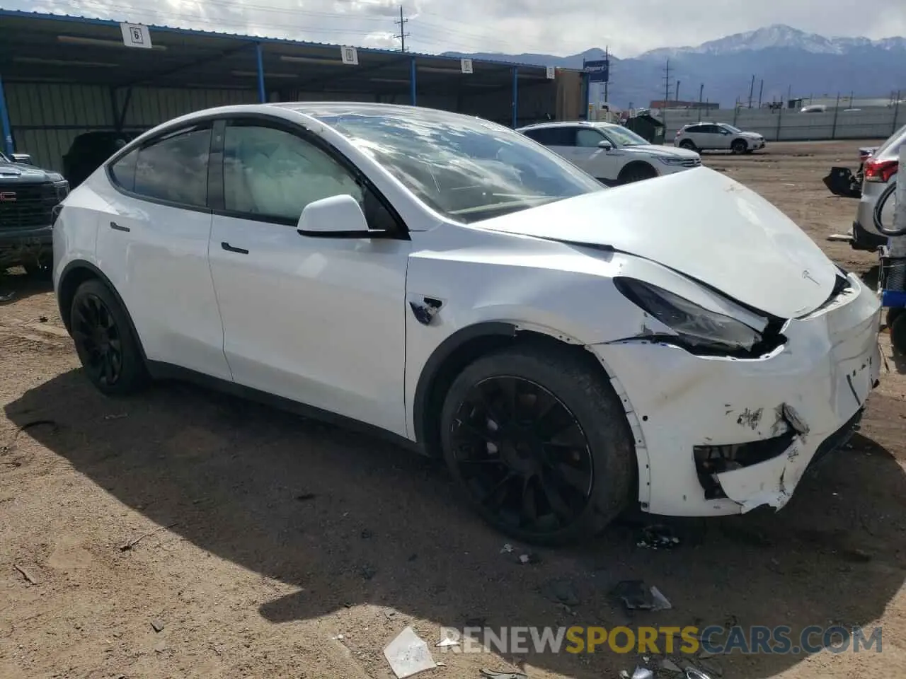 4 Photograph of a damaged car 5YJYGDEE8MF207009 TESLA MODEL Y 2021