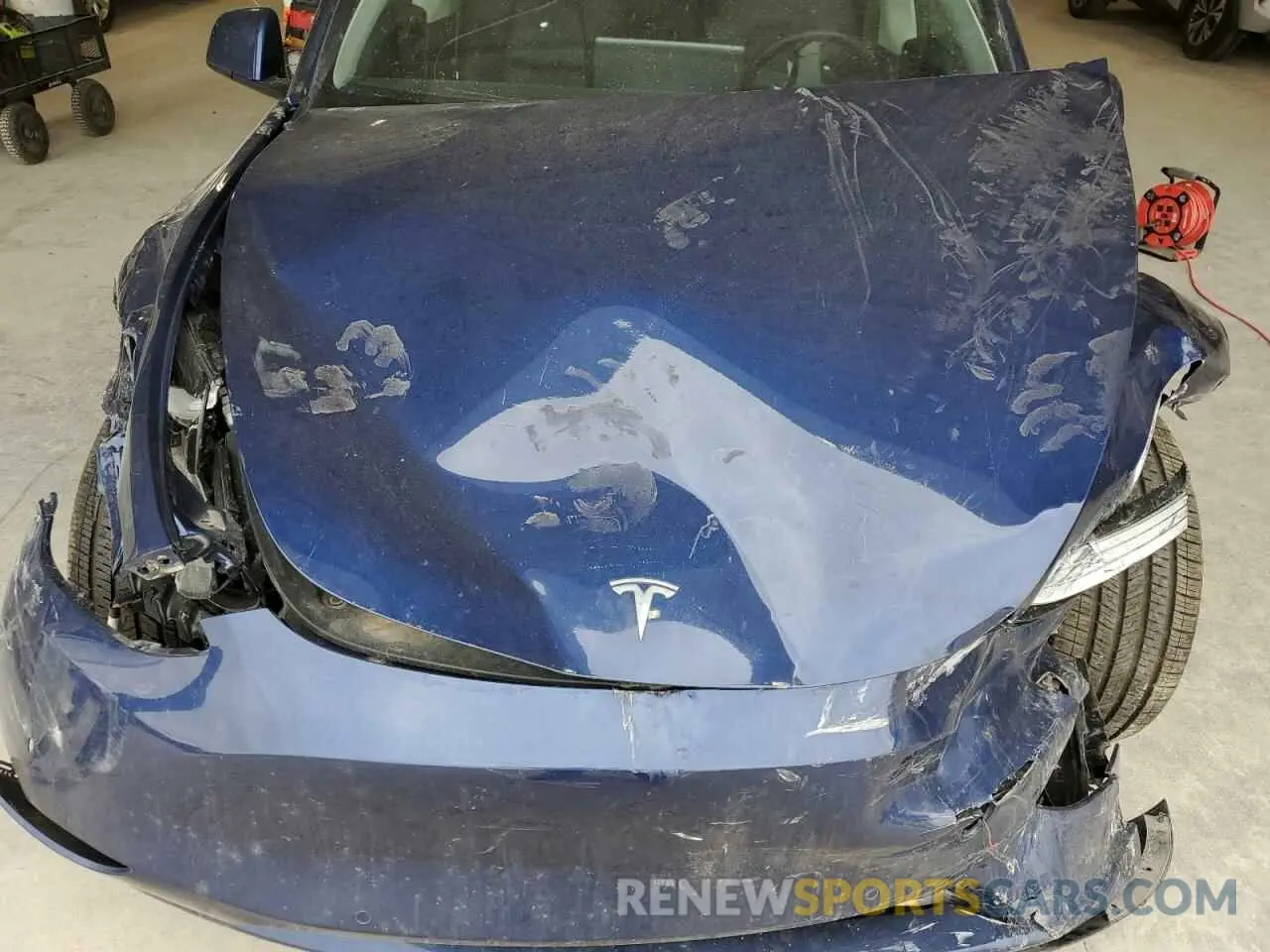 11 Photograph of a damaged car 5YJYGDEE8MF208063 TESLA MODEL Y 2021