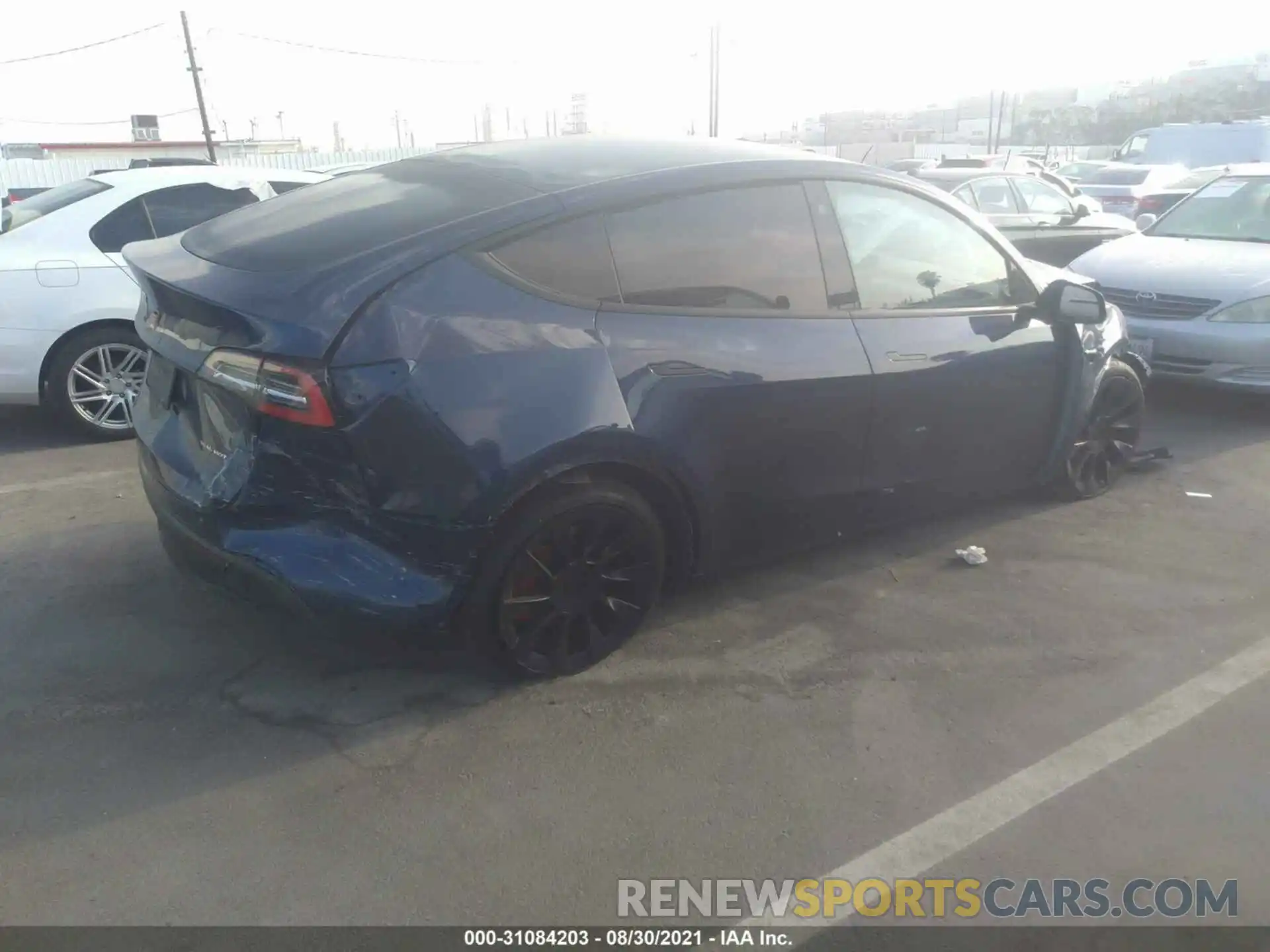 4 Photograph of a damaged car 5YJYGDEE9MF070789 TESLA MODEL Y 2021