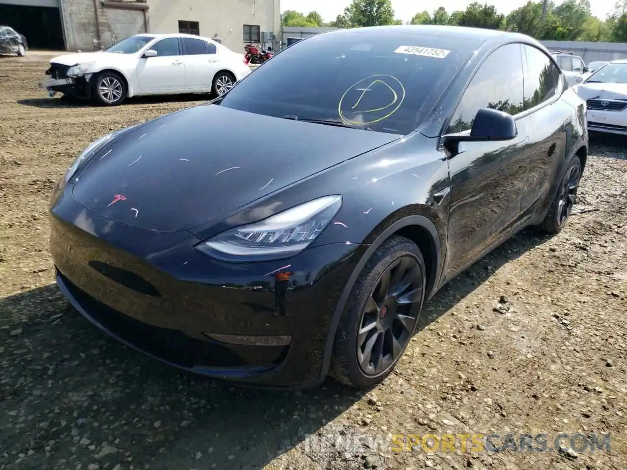 2 Photograph of a damaged car 5YJYGDEE9MF078410 TESLA MODEL Y 2021