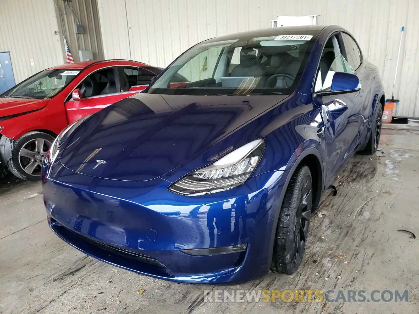 2 Photograph of a damaged car 5YJYGDEE9MF087558 TESLA MODEL Y 2021