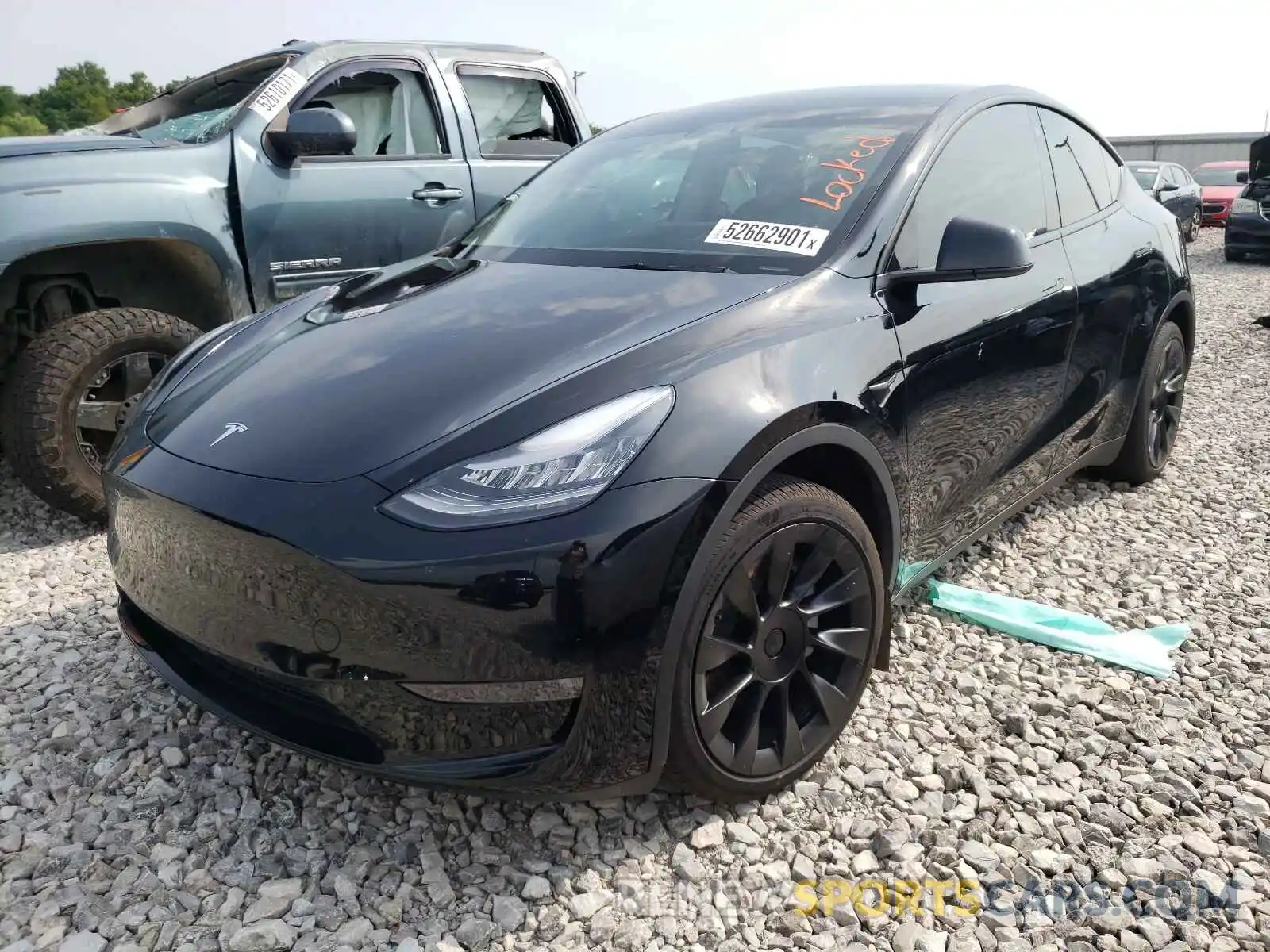 2 Photograph of a damaged car 5YJYGDEE9MF107923 TESLA MODEL Y 2021