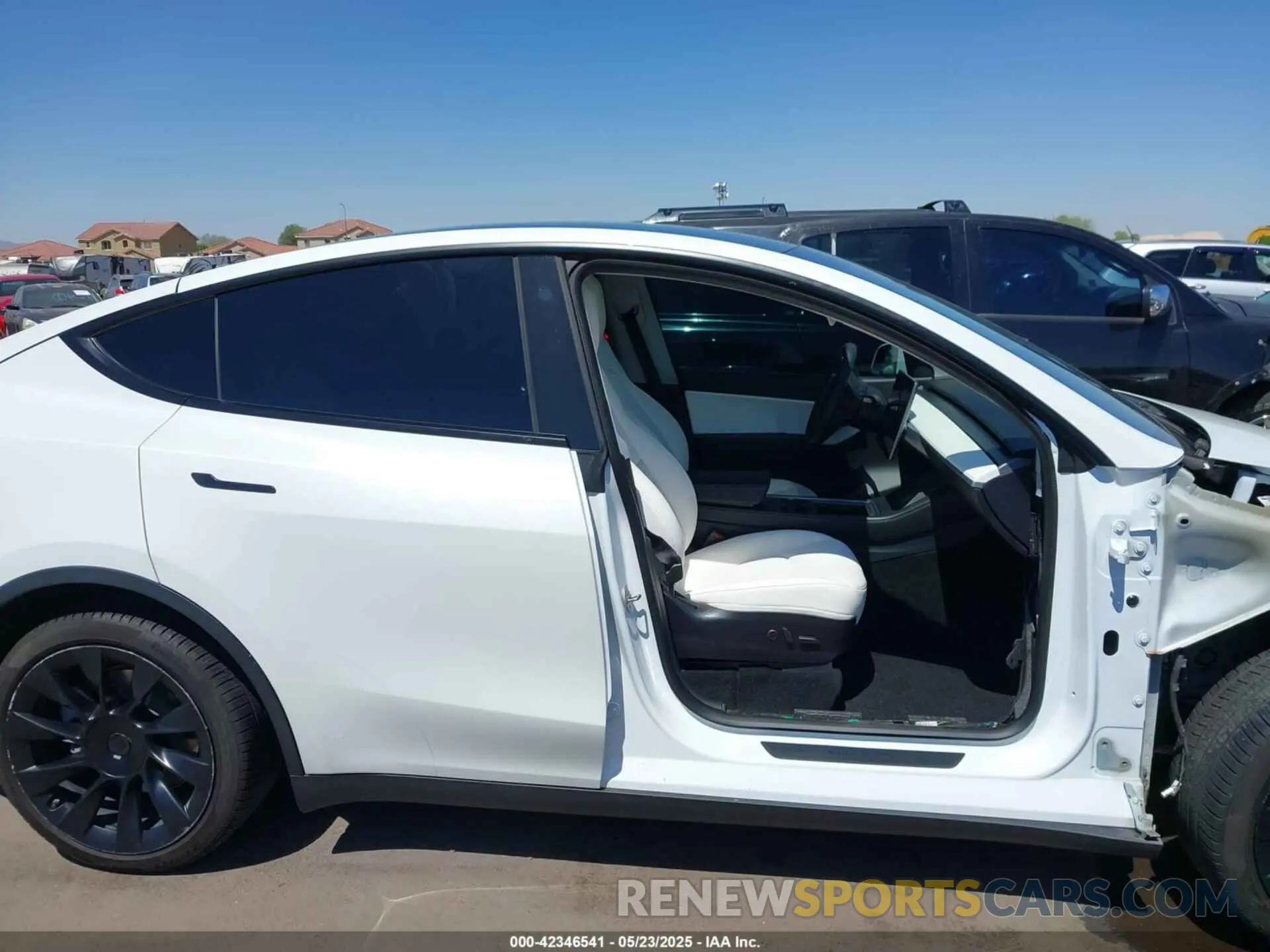 13 Photograph of a damaged car 5YJYGDEE9MF158242 TESLA MODEL Y 2021