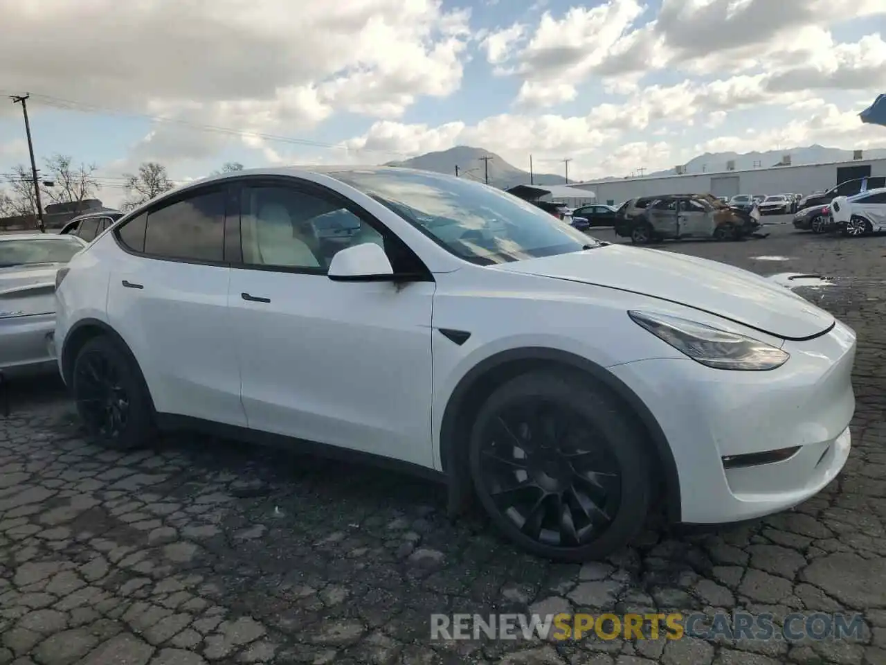 4 Photograph of a damaged car 5YJYGDEE9MF158337 TESLA MODEL Y 2021