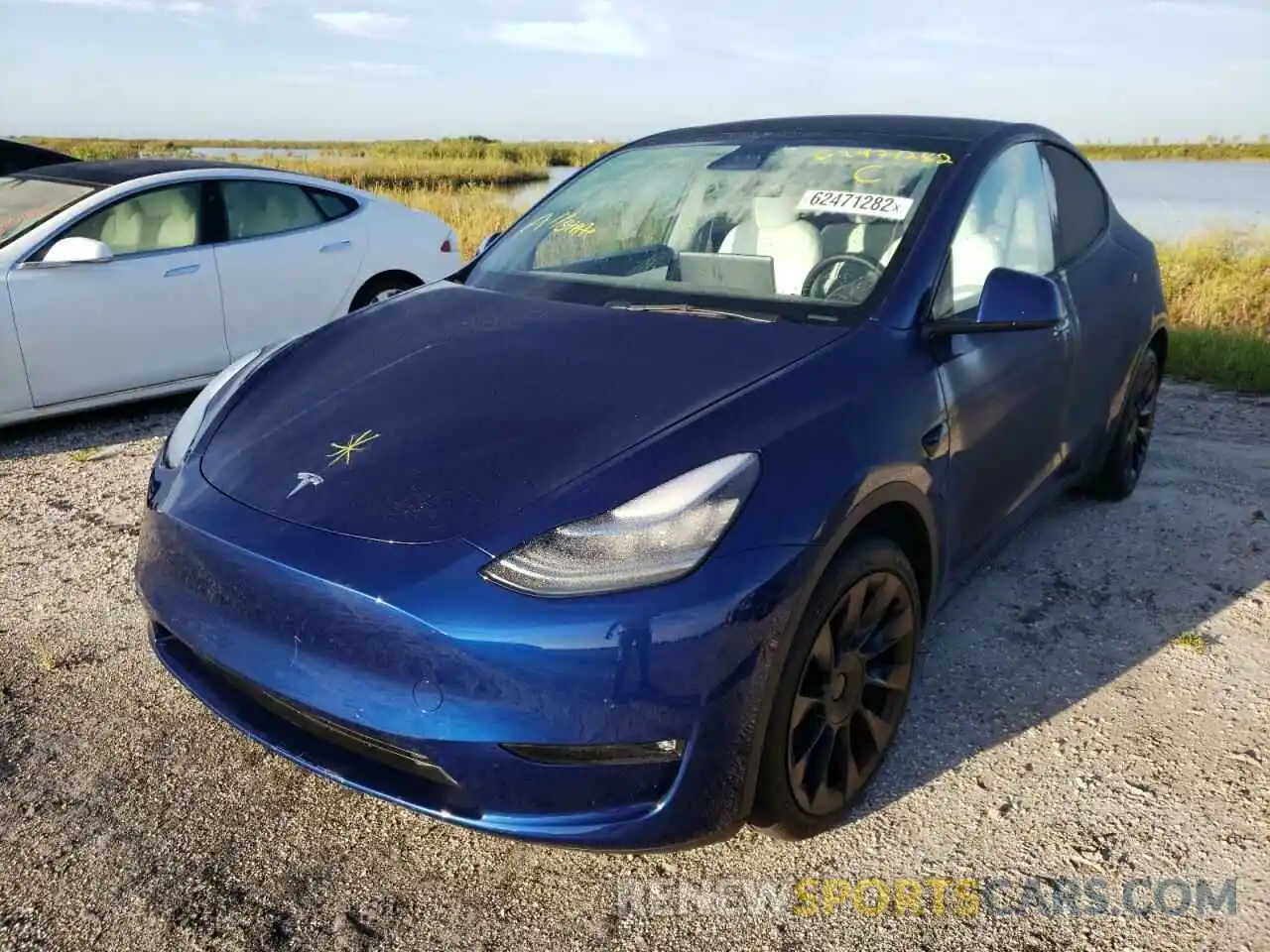 2 Photograph of a damaged car 5YJYGDEE9MF162016 TESLA MODEL Y 2021