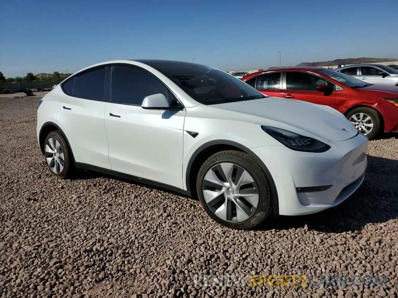 4 Photograph of a damaged car 5YJYGDEE9MF213725 TESLA MODEL Y 2021