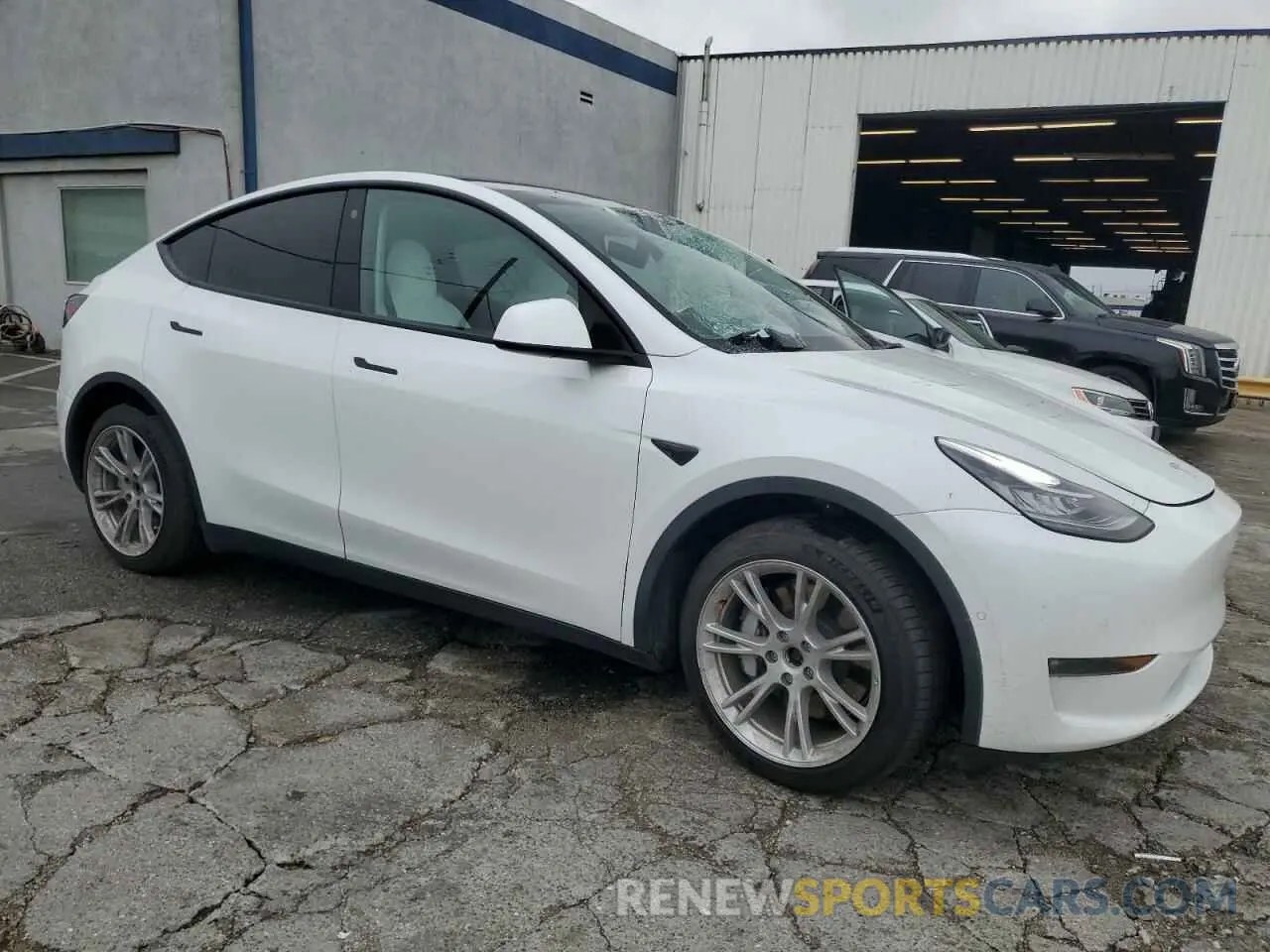 4 Photograph of a damaged car 5YJYGDEE9MF282138 TESLA MODEL Y 2021