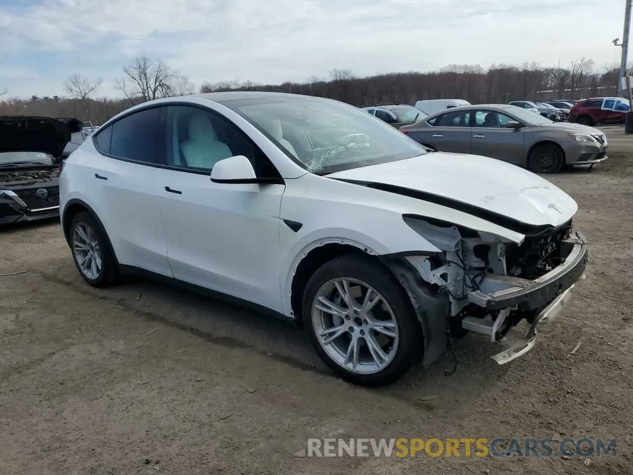 4 Photograph of a damaged car 5YJYGDEEXMF063219 TESLA MODEL Y 2021