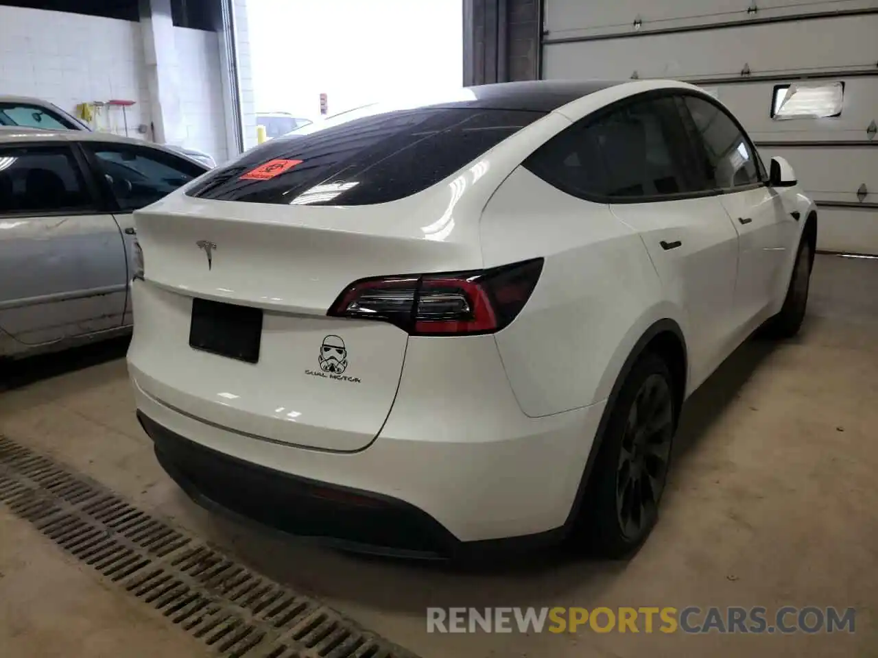 4 Photograph of a damaged car 5YJYGDEEXMF079744 TESLA MODEL Y 2021