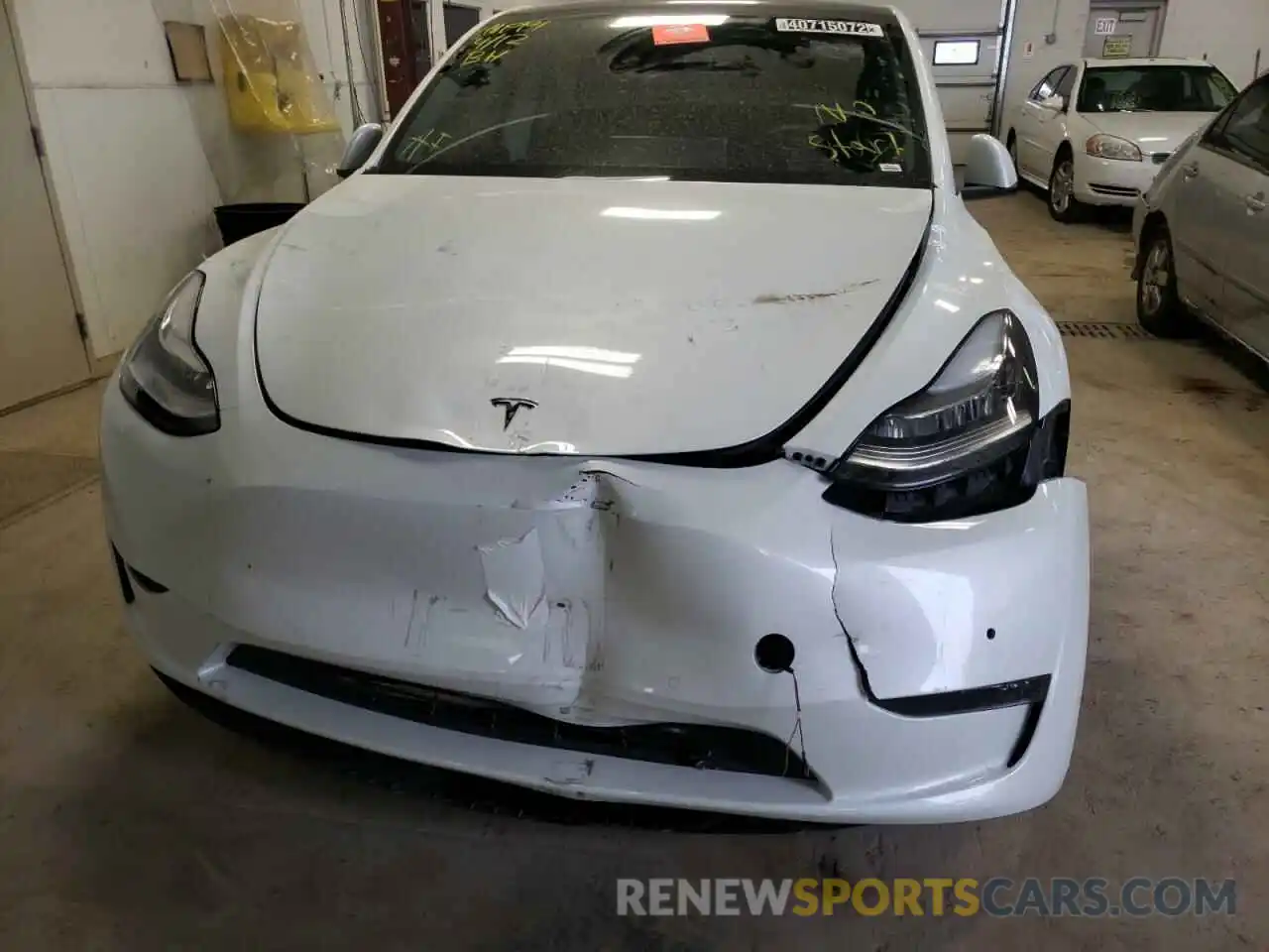 9 Photograph of a damaged car 5YJYGDEEXMF079744 TESLA MODEL Y 2021