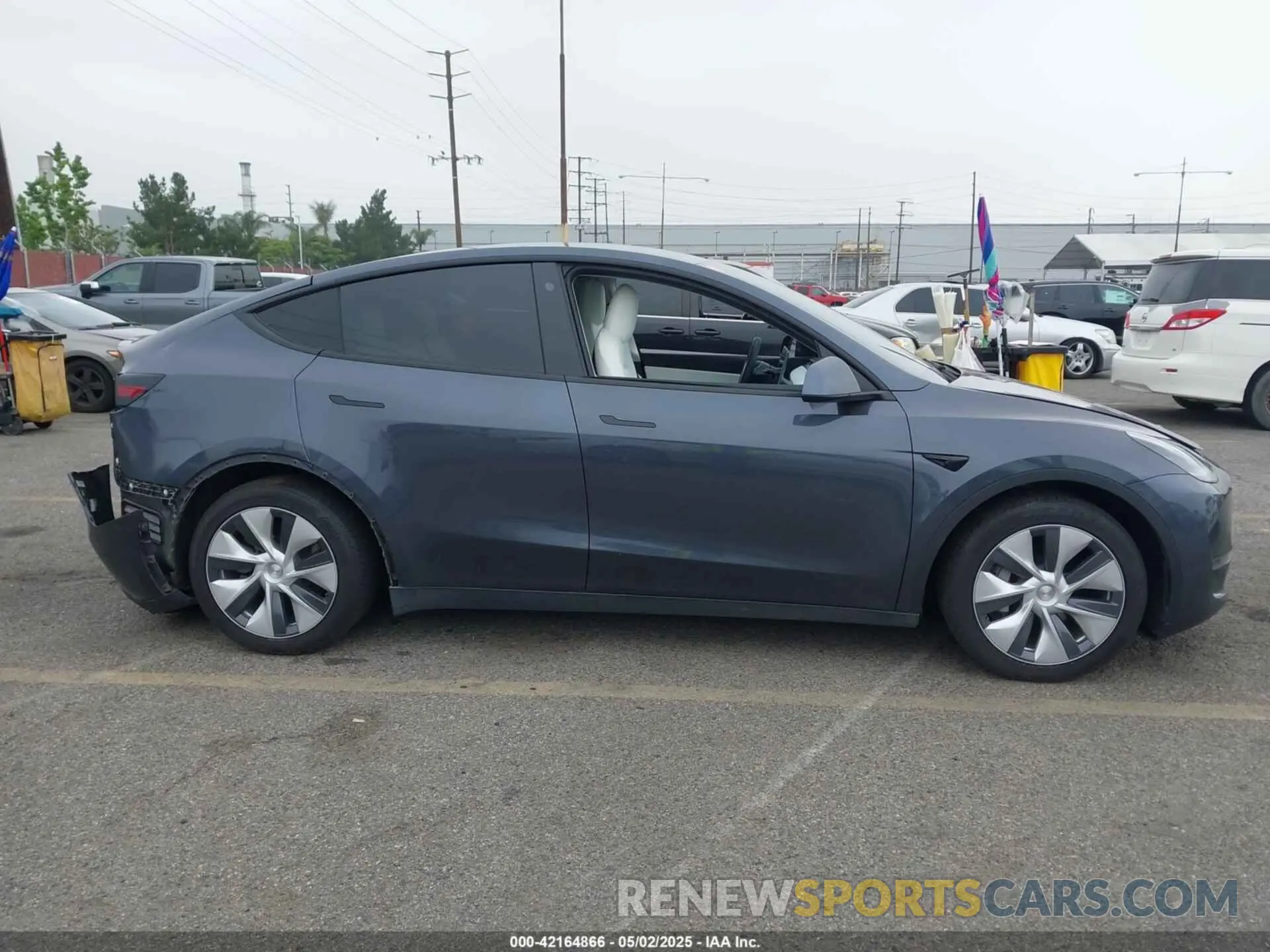 14 Photograph of a damaged car 5YJYGDEEXMF092901 TESLA MODEL Y 2021