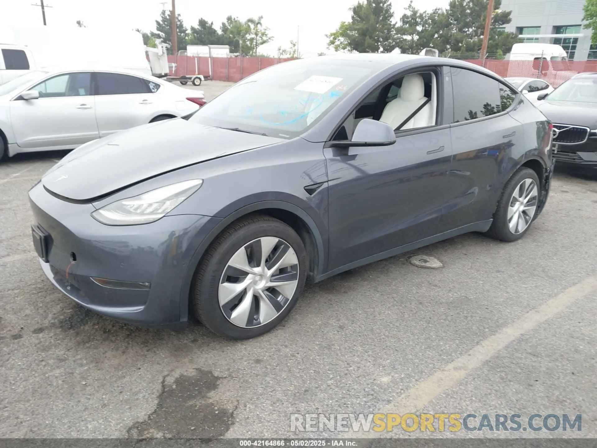 2 Photograph of a damaged car 5YJYGDEEXMF092901 TESLA MODEL Y 2021
