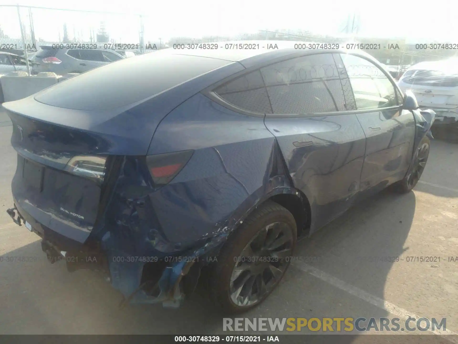 4 Photograph of a damaged car 5YJYGDEEXMF161585 TESLA MODEL Y 2021