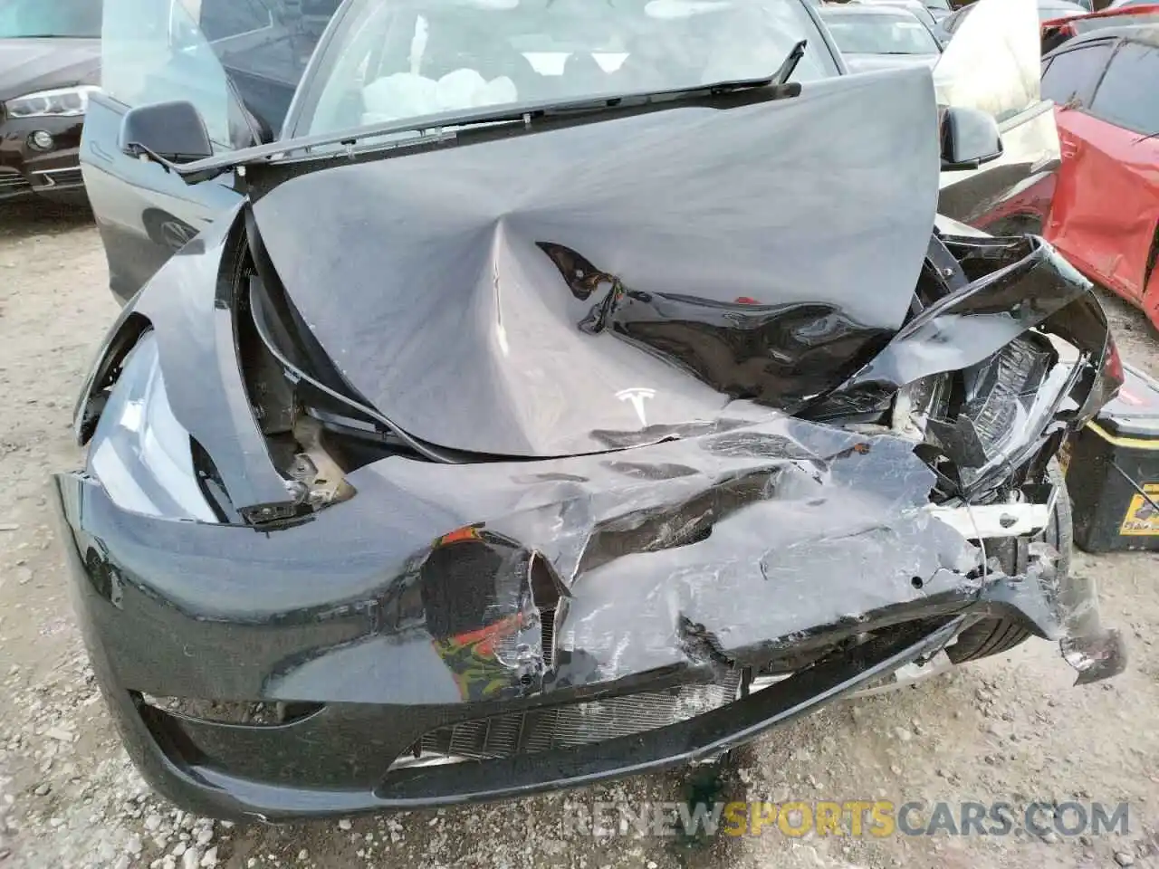 7 Photograph of a damaged car 5YJYGDEEXMF183103 TESLA MODEL Y 2021