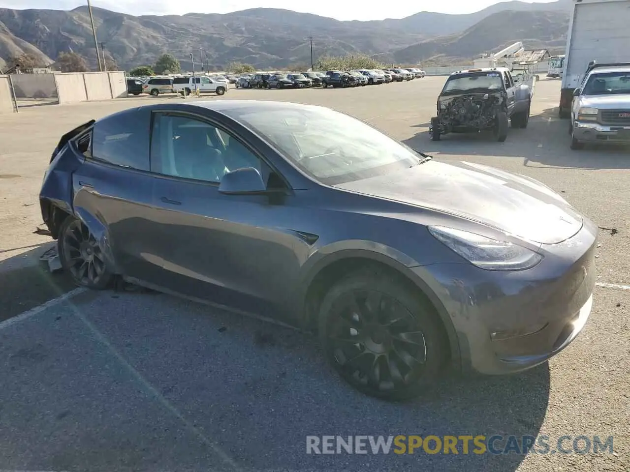 4 Photograph of a damaged car 5YJYGDEEXMF217475 TESLA MODEL Y 2021